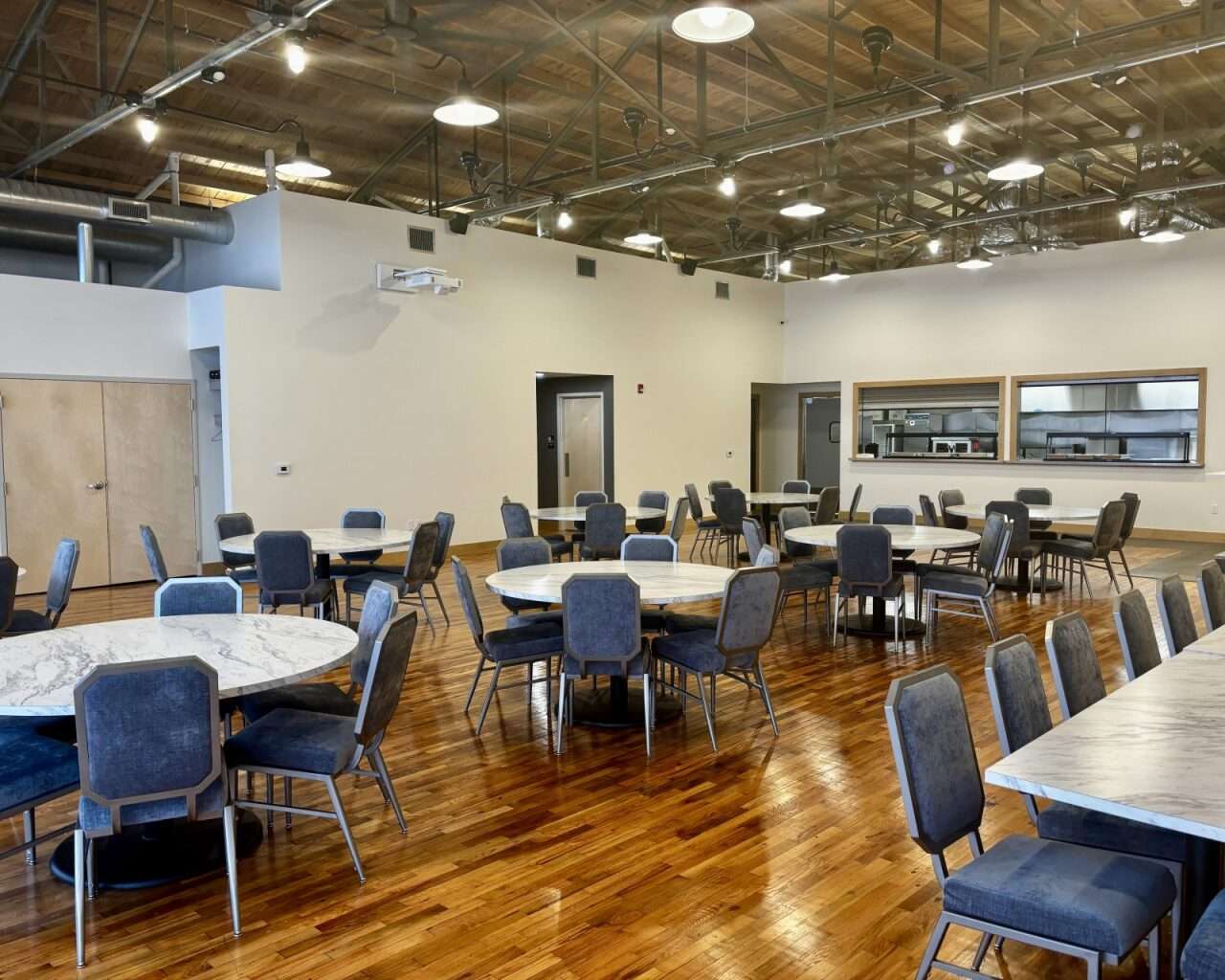 Chairs and tables at the event center next to Gella's Diner and LB Brewing in Hays. Photo by Tony Guerrero/Hays Post