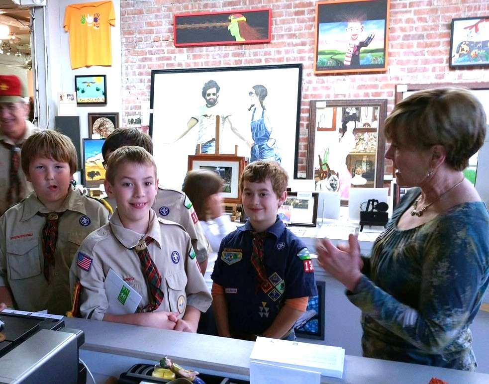 Brenda Meder with Boy Scouts in the Hays Arts Center annex. Courtesy photo