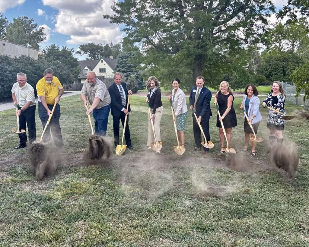 Fort Hays State University President Tisa Mason, alongside several speakers and staff at the FHSU Stroup Hall groundbreaking ceremony, tosses soil. Photo by Tony Guerrero/Hays Post