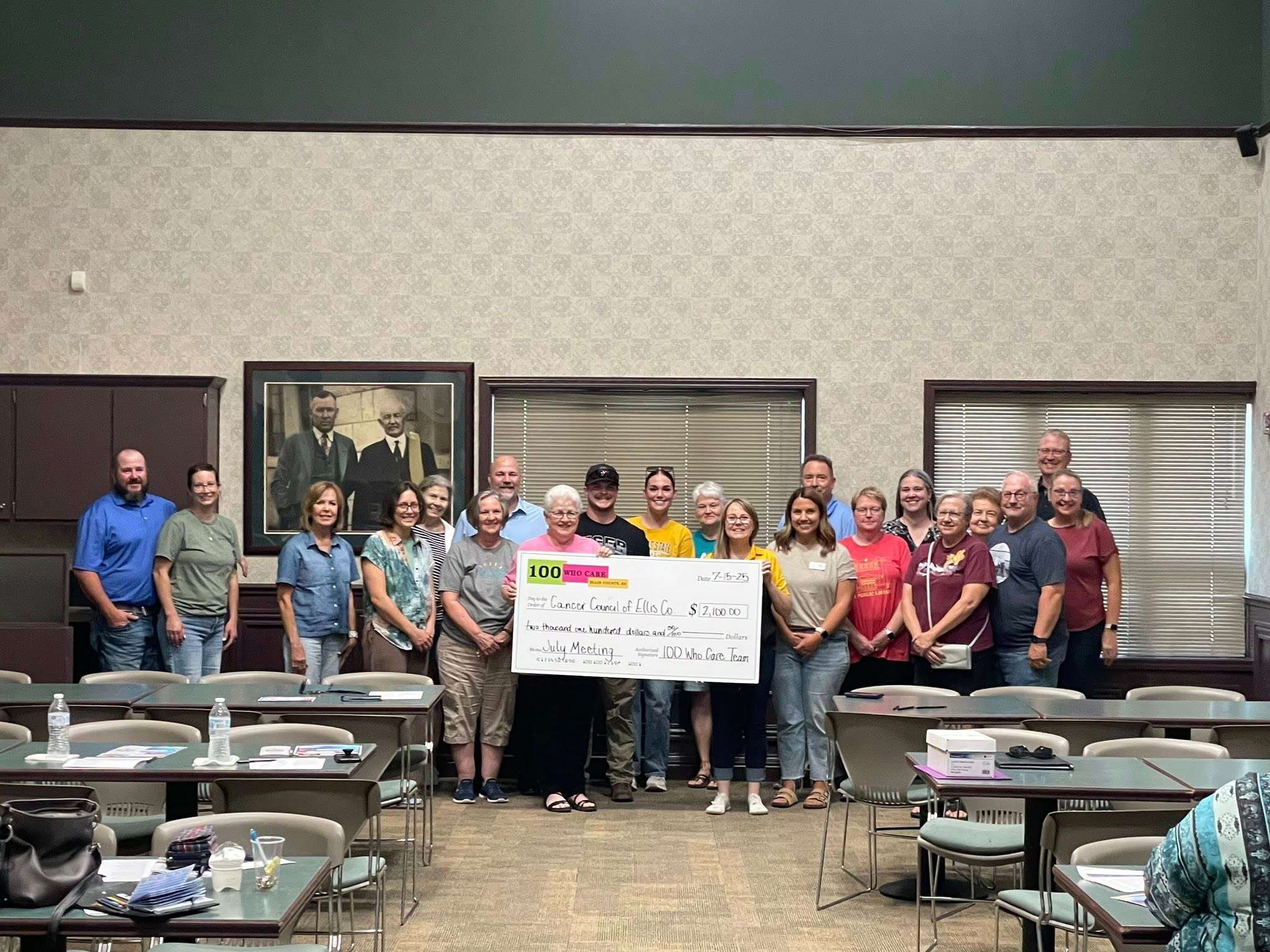 The 100 Who Care group presenting a check to the Cancer Council of Ellis County in its first round of giving in July. Courtesy photo