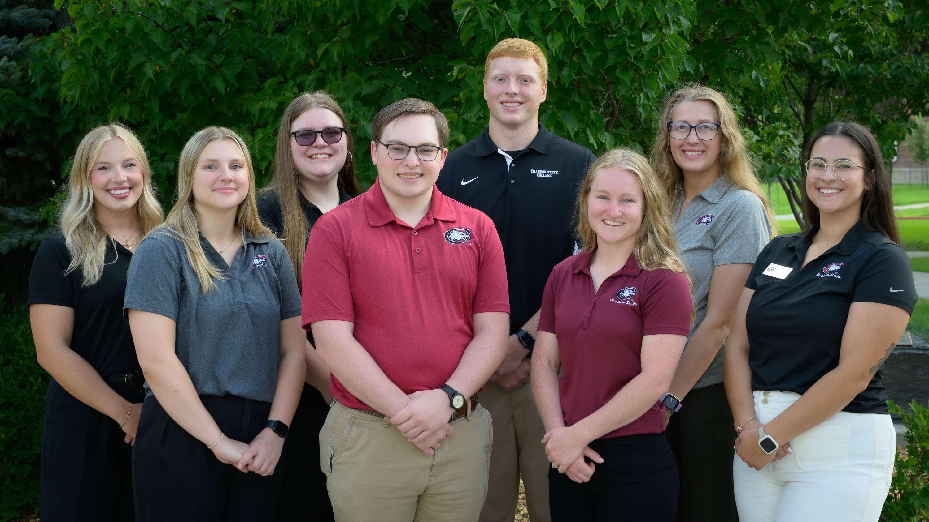 Chadron State College Admissions employees, July 2025. From left: Kennie Gable, Erin Orn, Sandra Arlt, Jack Leuenberger, Sam McKinley, Carlie Collier, Courtney Bremer, and Gabriela Perez-Patterson. (Photo by Daniel Binkard/Chadron State College).