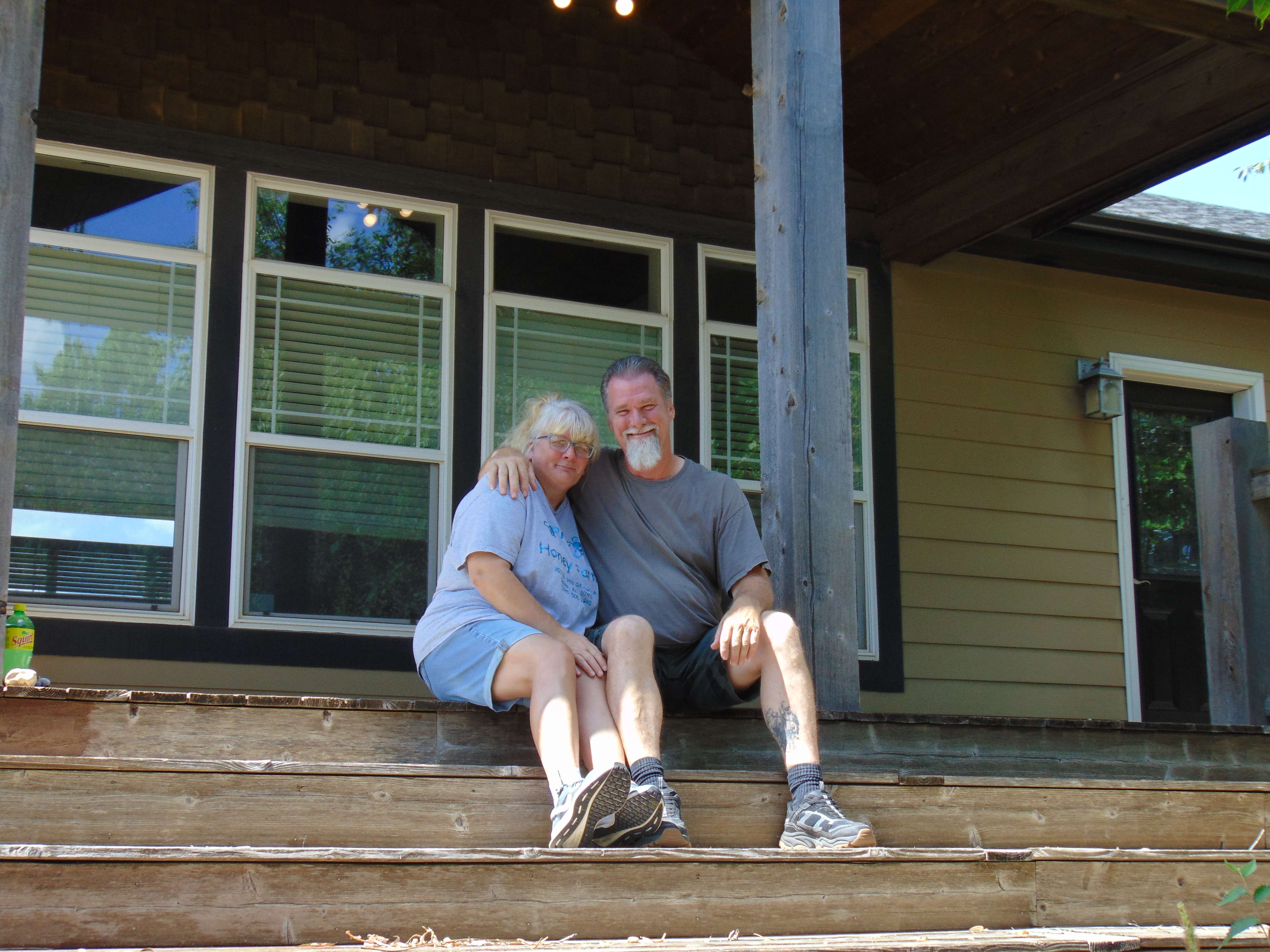 Judy and Allen on the porch of their new property. Photo by Nicolas Fierro