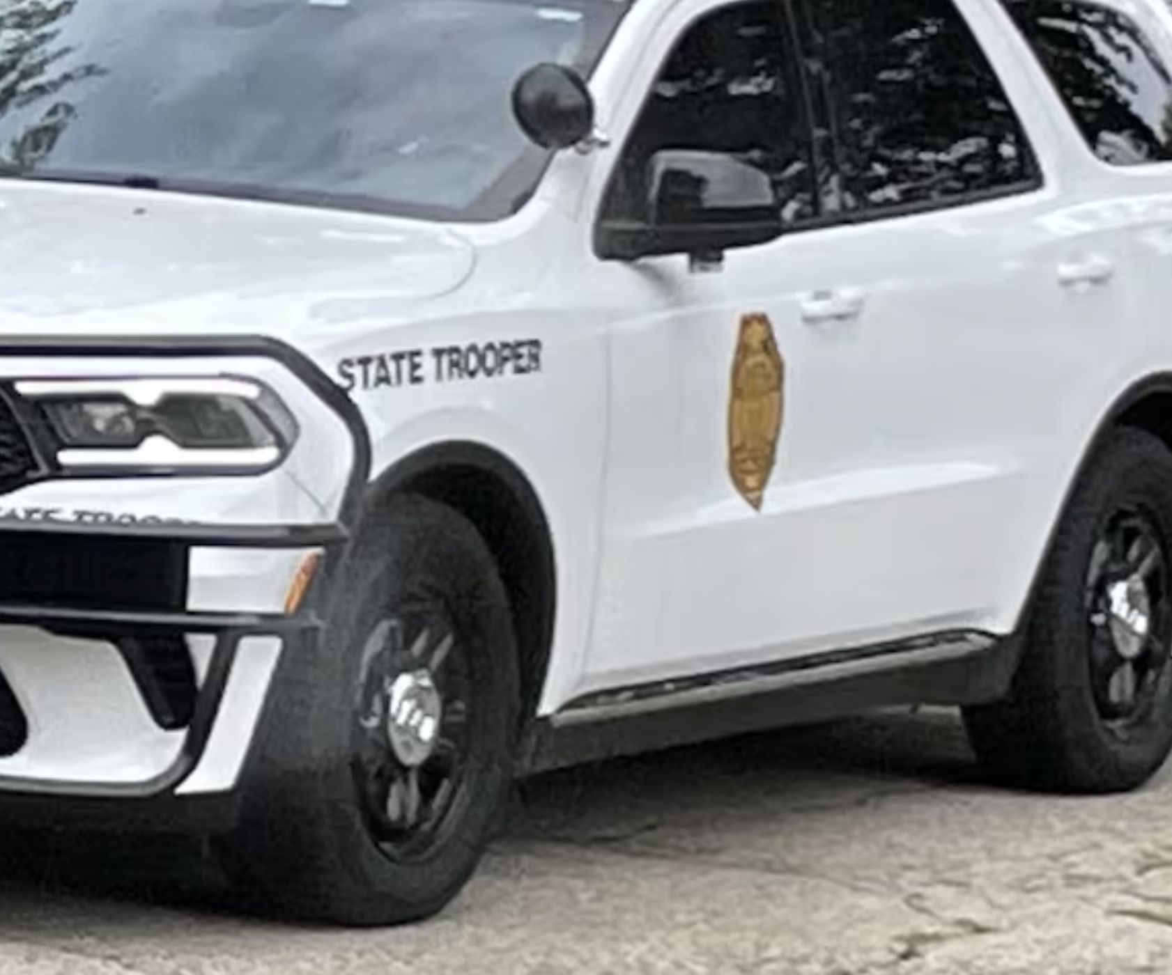 NW Kansas woman hospitalized after car struck utility trailer