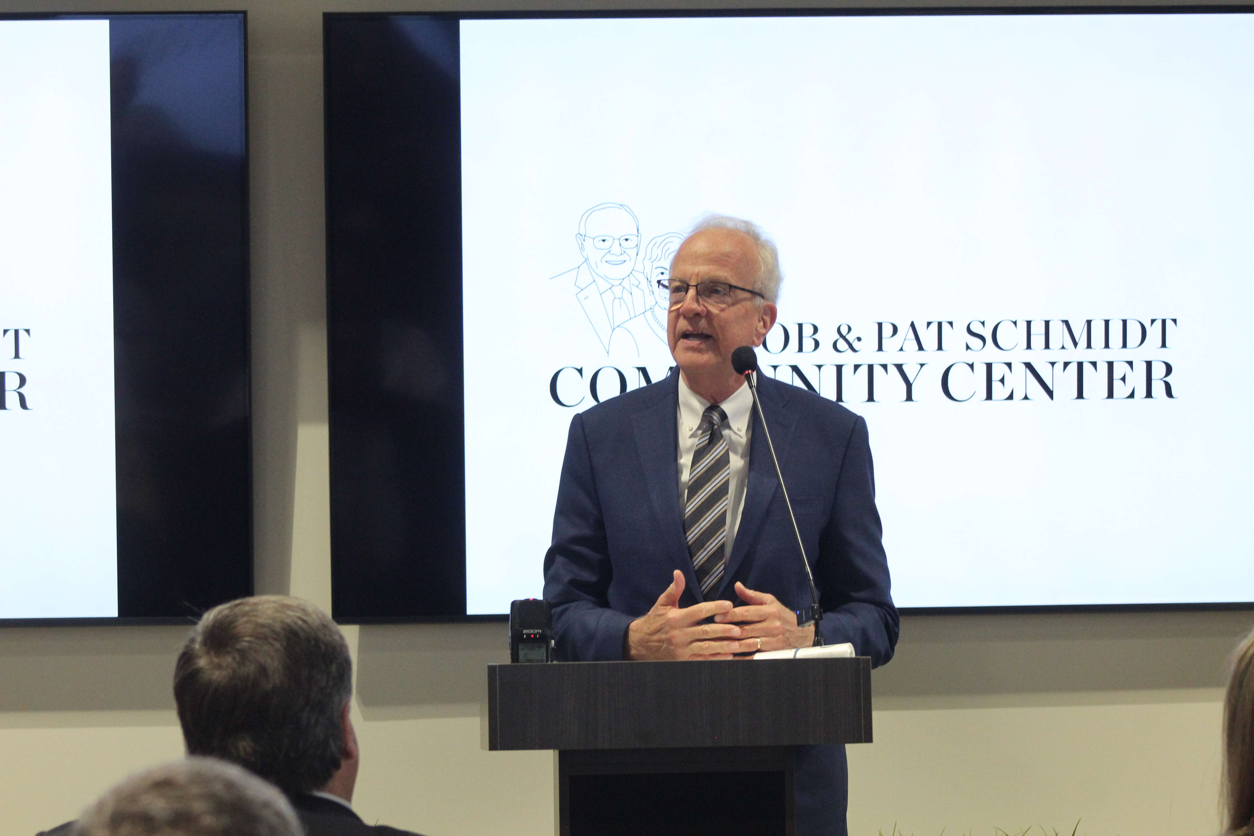 Sen. Jerry Moran, R-Kansas, speaks to the group gathered for the ribbon cutting of the community center. He said other communities will look at the center and the surrounding Grove housing development as a model. Photo by Cristina Janney/Hays Post