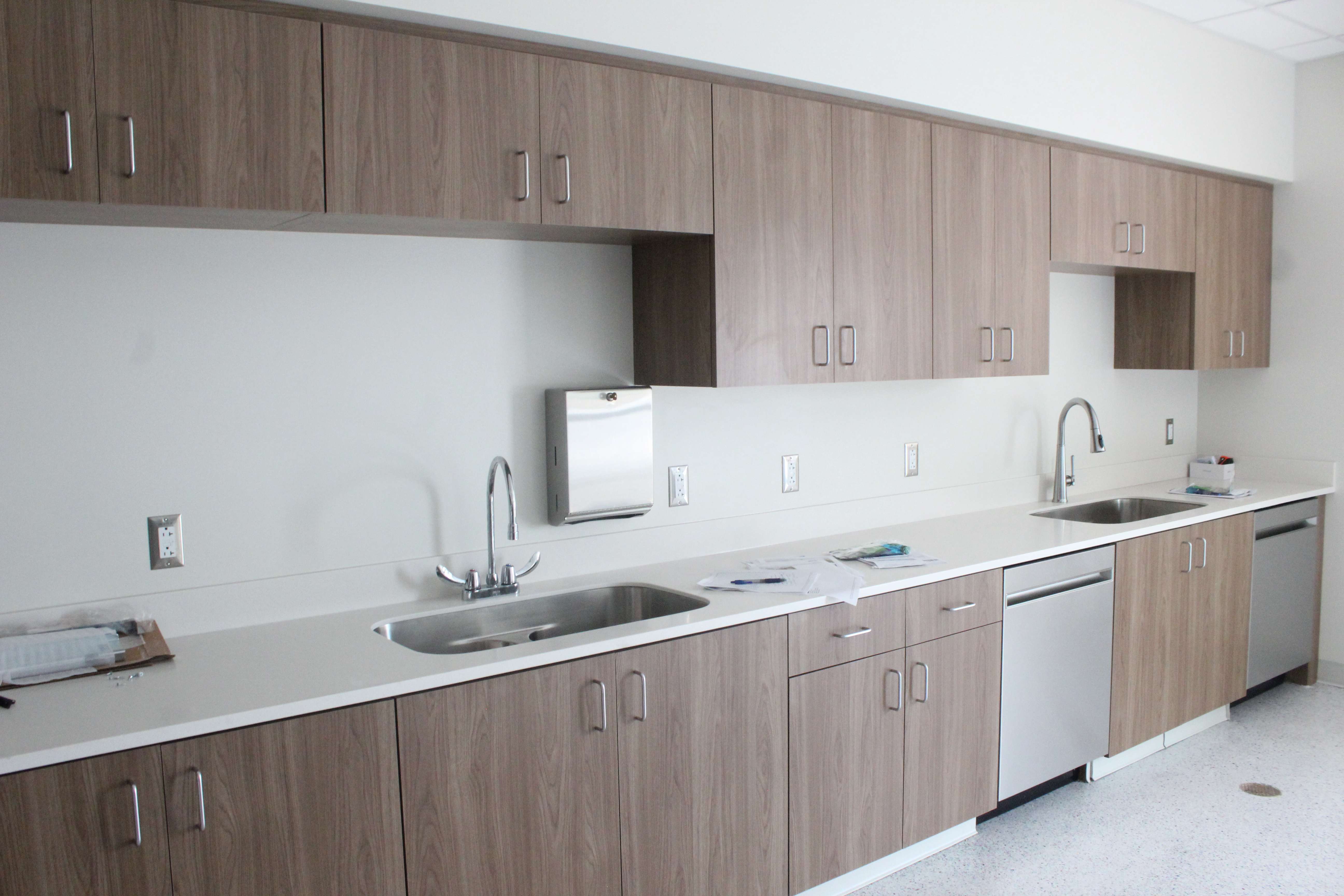 A bank of sinks and cabinets in the new child care wing of the community center. File photo