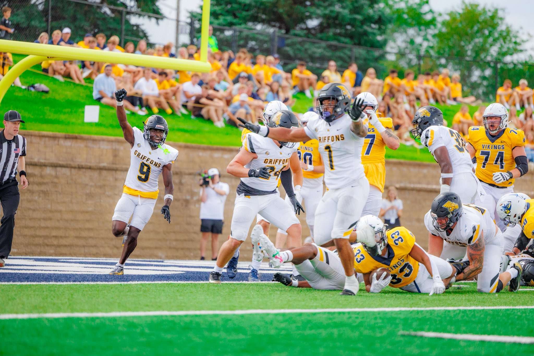 Missouri Western linebacker Kienen Gaskin (1) and defensive back Kamron Lee (9) celebrate a fourth and goal stop. The Griffons fell to Augustana 30-26 on a last second touchdown/ Photo courtesy of MoWest Athletics