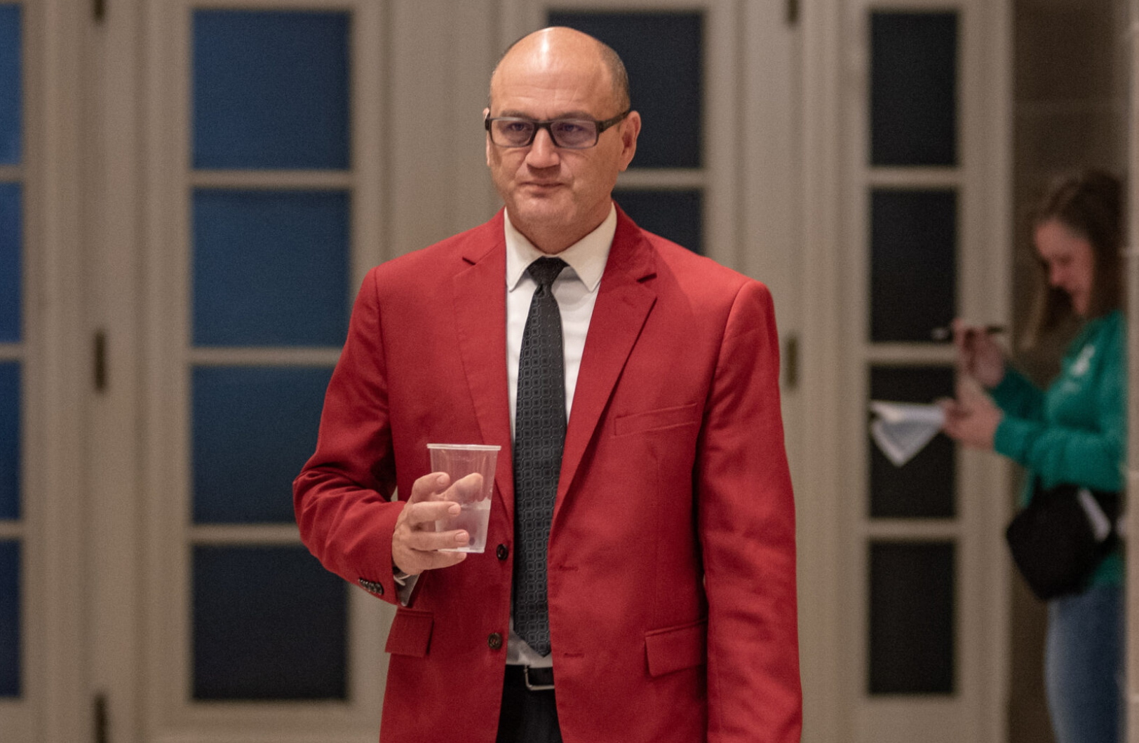 Missouri Secretary of State Denny Hoskins walks into a Missouri Right to Life rally wearing his signature red sport coat in March. Hoskins is currently facing two lawsuits alleging he crafted deceptive ballot language for public-education initiative petitions (Annelise Hanshaw/Missouri Independent).