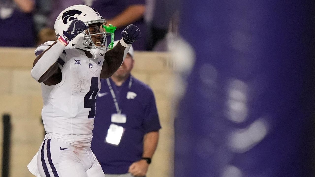 Kansas State running back Joe Jackson celebrates after scoring a touchdown during the second half of an NCAA college football game against North Dakota, Saturday, Aug. 30, 2025, in Manhattan, Kan. (AP Photo/Charlie Riedel)