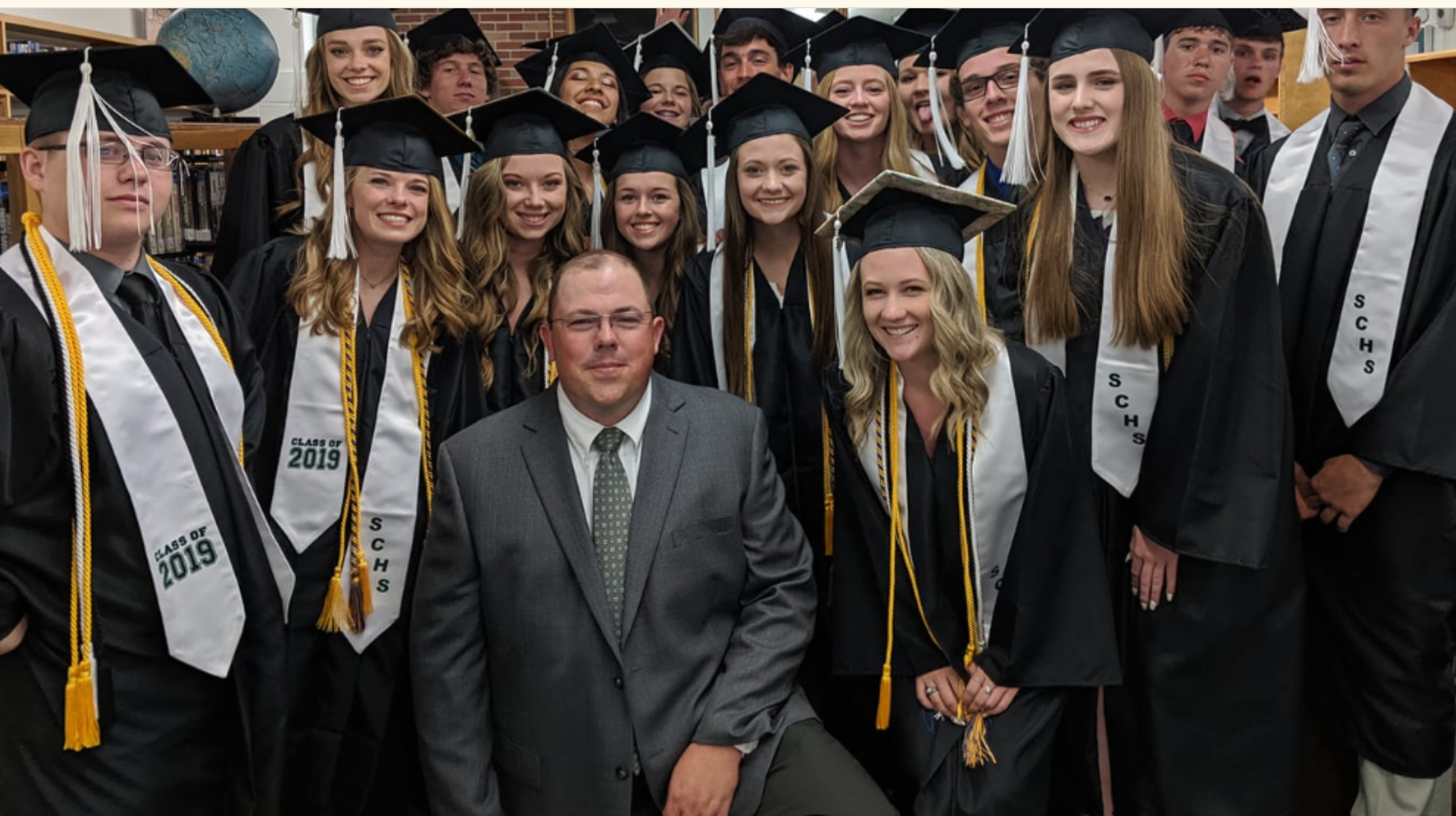 Comanche County School District Superintendent Ty Theurer, photographed with the 2019 graduating class at South Central High School in Coldwater, is under investigation for alleged sexual harassment of a student. He was serving as golf coach this spring, according to the student’s complaint, when he told her to hold golf clubs as if she was grasping a penis. (Comanche County School District)