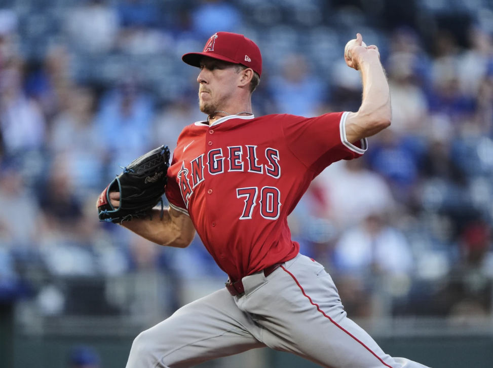 Los Angeles Angels starting pitcher Mitch Farris throws as he makes his major league debut during the first inning of a baseball game against the Kansas City Royals, Tuesday, Sept. 2, 2025, in Kansas City, Mo. (AP Photo/Charlie Riedel)