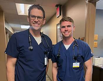 Third-year medical student Jack Thomas, right, is spending the summer learning from Matthew Lightner, M.D., a KU School of Medicine-Wichita graduate, and other doctors at the Scott City Clinic. Courtesy photo