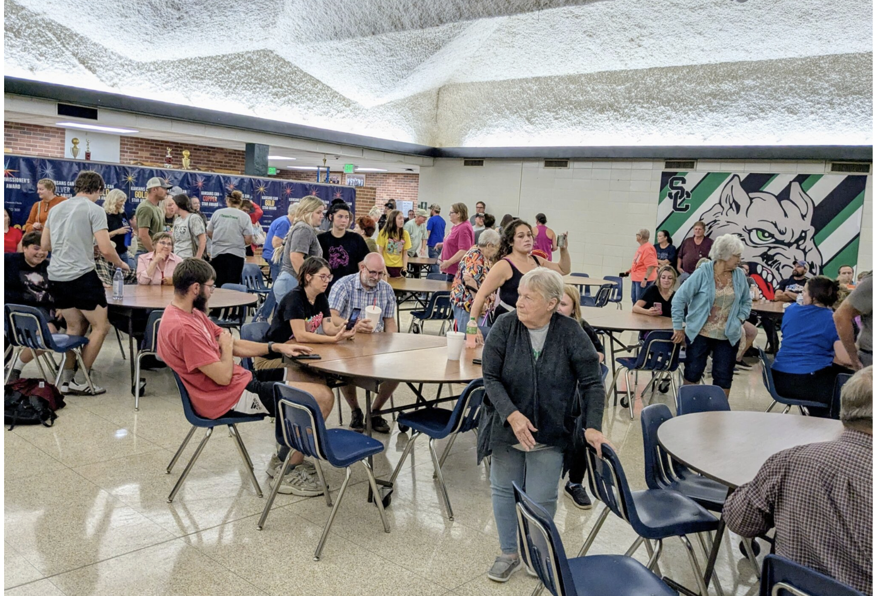 More than 100 people attended a Comanche County School District meeting Wednesday to press the school board to suspend or fire superintendent Ty Theurer, who has been accused of sexually harassing a student. The board voted to place him on paid administrative leave. (Tim Carpenter/Kansas Reflector)