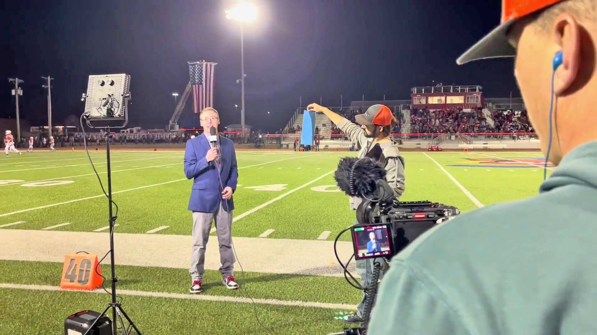 Cameron Birney live at a football game.
