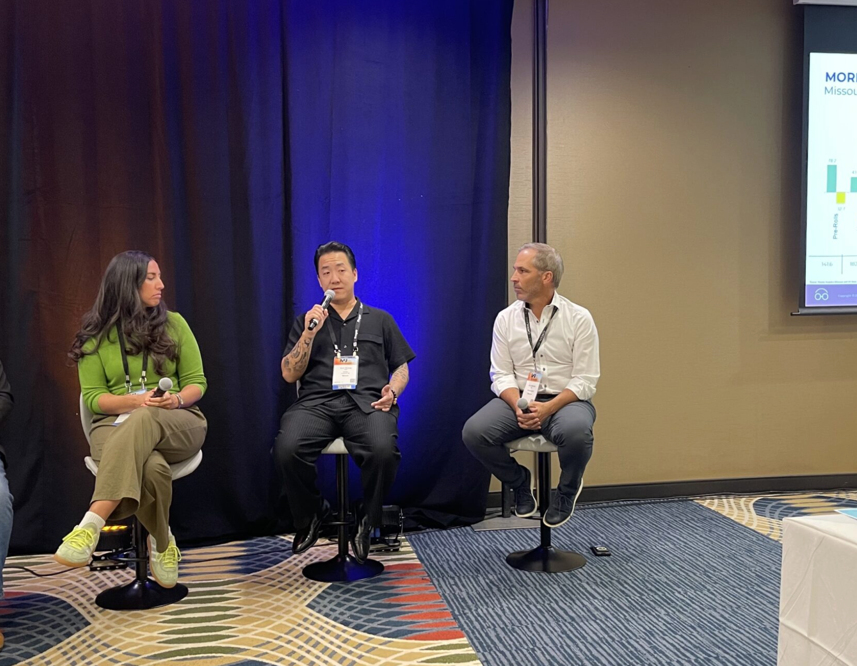  At the MJ Unpacked cannabis conference in St. Louis Thursday, Krista Raymer of C3 Industries, Sam Soong of Grön, and John Mueller of Greenlight speak about retail market trends in Missouri’s cannabis market (Rebecca Rivas/Missouri Independent).