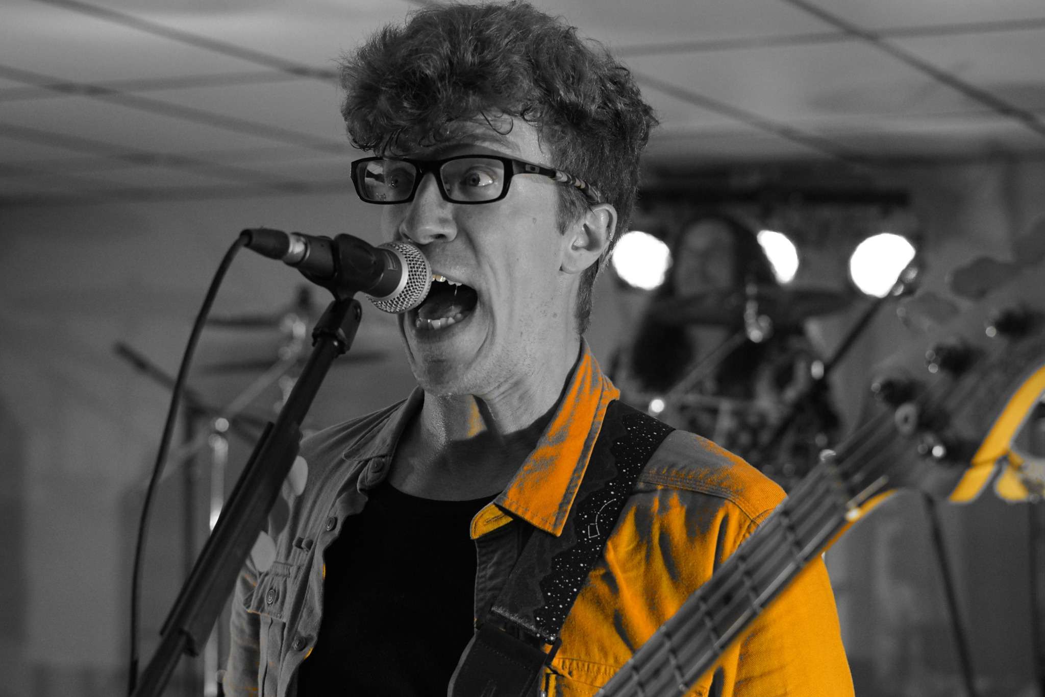 Kris from Stop.Drop.Rewind performing in Scottsbluff 2024. Photo by Kalin Krohe