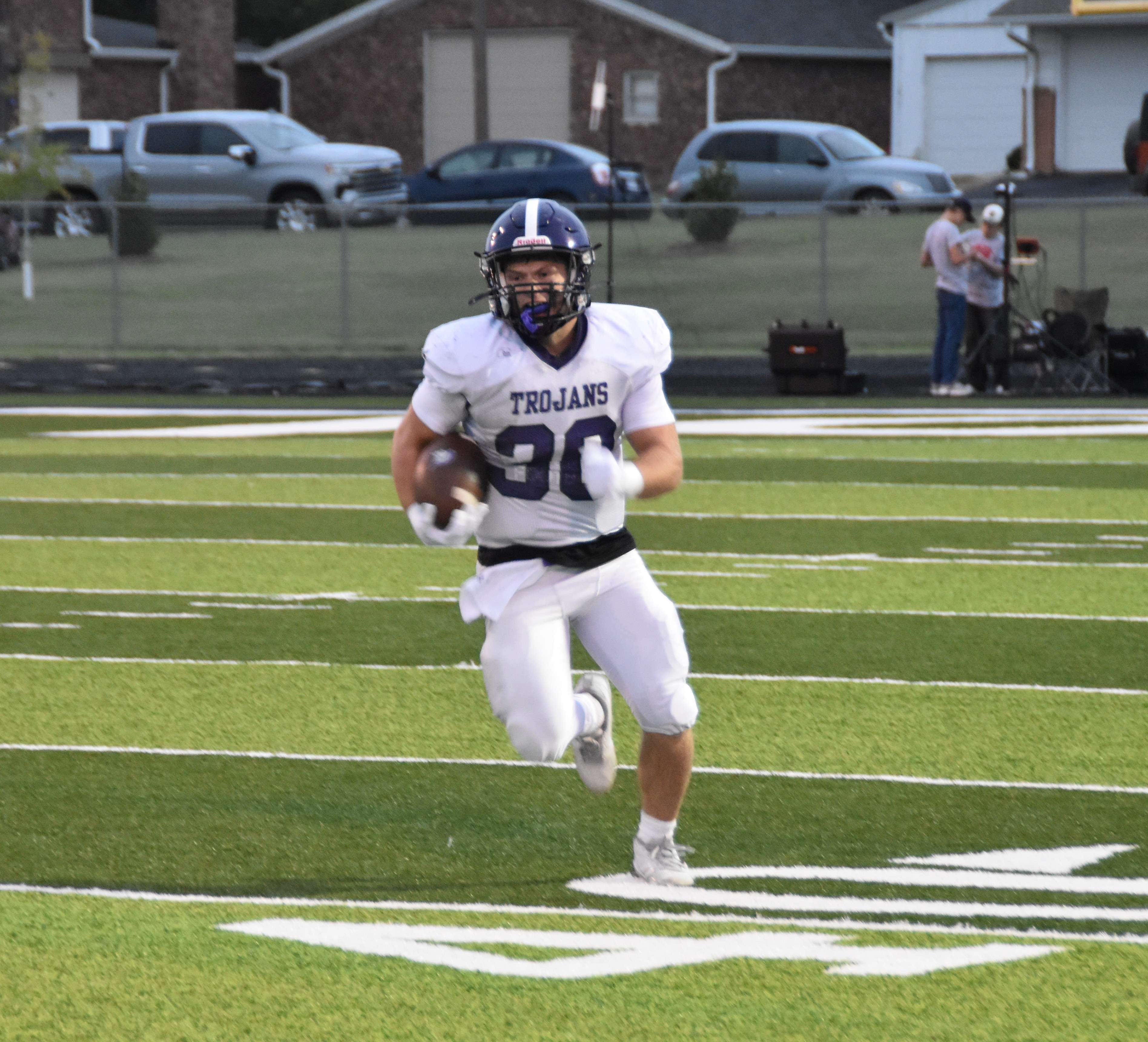 Grady Gebhardt snaps off a big carry against Minneapolis. Photo courtesy of Jeremy Obermeyer.