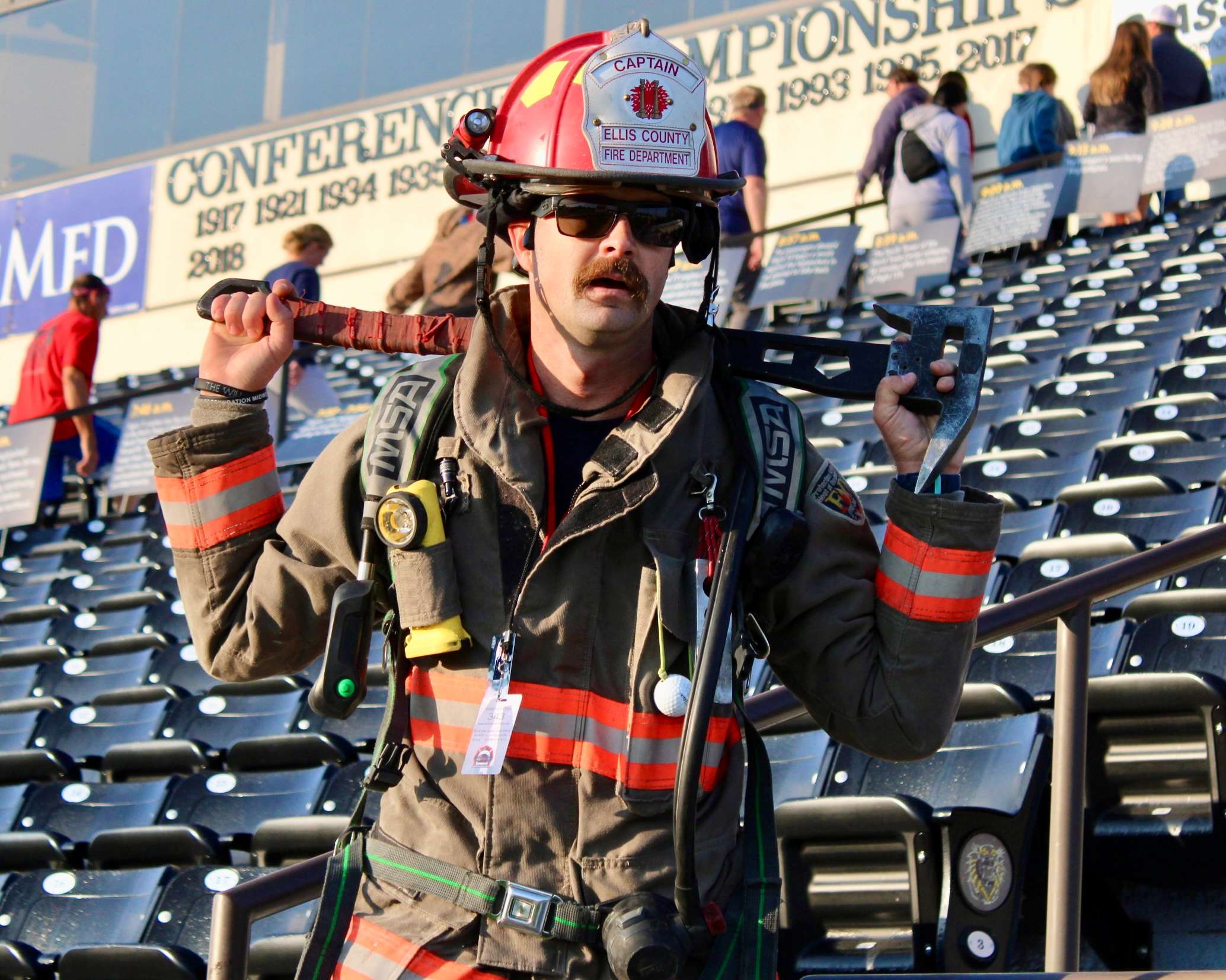 A firefighter with an axe&nbsp;at the 9/11 Memorial Stair Climb. Photo by Tony Guerrero/Hays Post