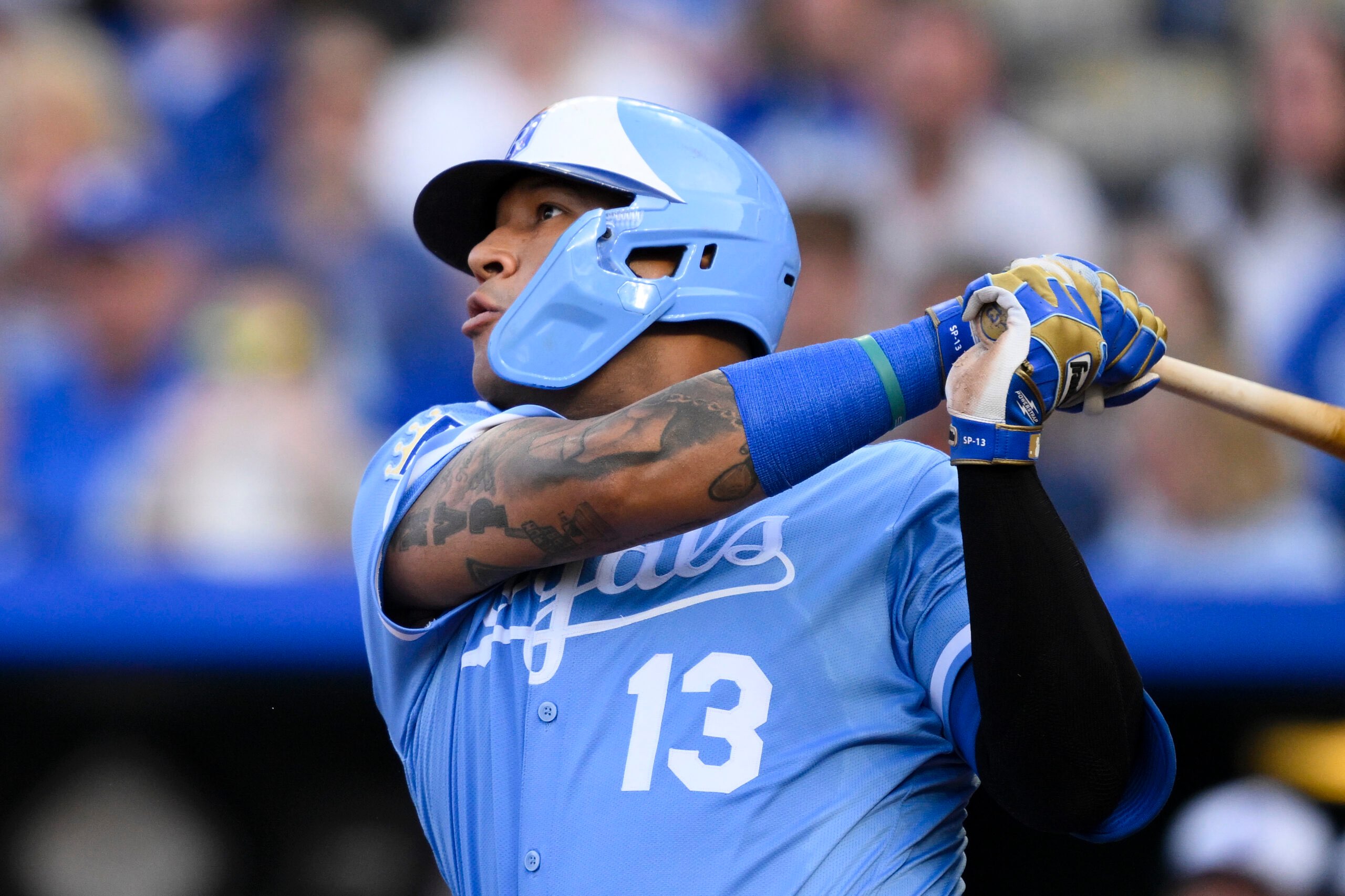 Kansas City Royals' Salvador Perez watches his three-run home run sail into the stands during the first inning of a baseball game against the Minnesota Twins in Kansas City, Mo., Saturday, Sept. 6, 2025. (AP Photo/Reed Hoffmann)