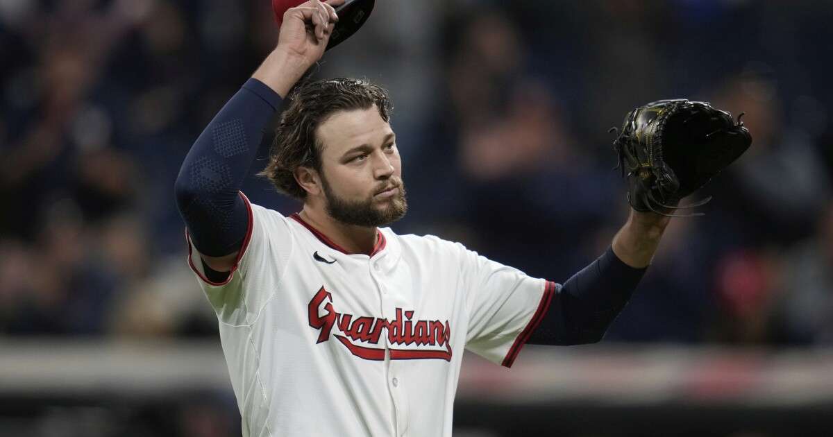 Cleveland Guardians starting pitcher Slade Cecconi walks off the mound after the eighth inning of a baseball game against the Kansas City Royals in Cleveland, Monday, Sept. 8, 2025. (AP Photo/Sue Ogrocki)