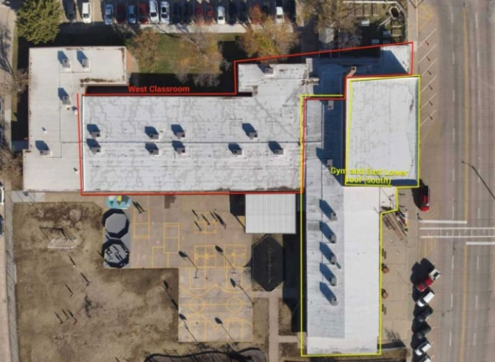 USD 428 is planning a replacement of the roof at Park Elementary School in Great Bend. Of particular concern is the area outlined in red, including a leaky section of the roof near the playground.