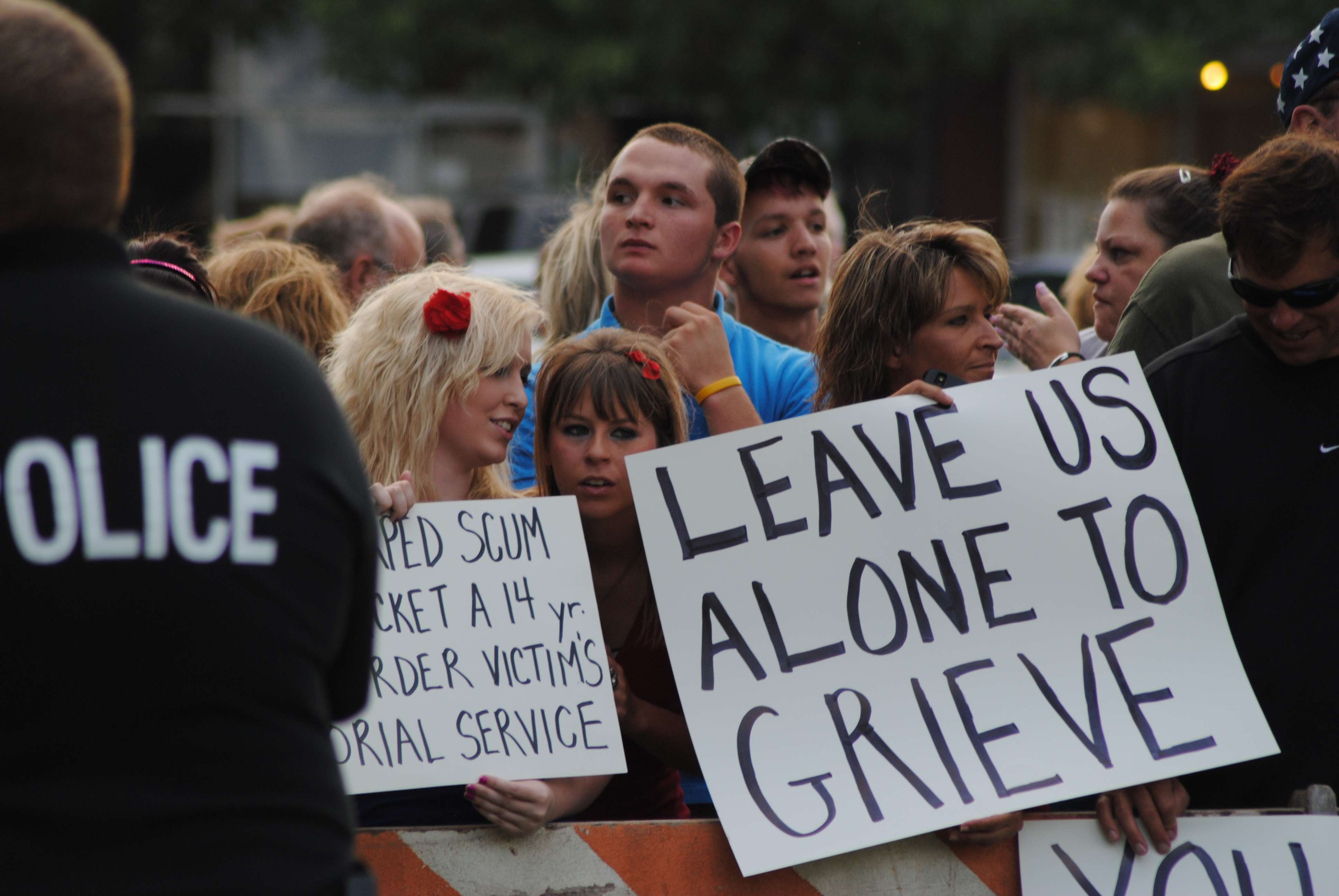 Great Bend residents attend an August 2010 protest at the Barton County Courthouse. (photo by Mike Courson)
