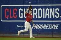 Cleveland Guardians right fielder CJ Kayfus catches a fly ball hit for an out but Kansas City Royals' Maikel Garcia in the eighth inning of a baseball game in Cleveland, Thursday, Sept. 11, 2025. (AP Photo/Sue Ogrocki)