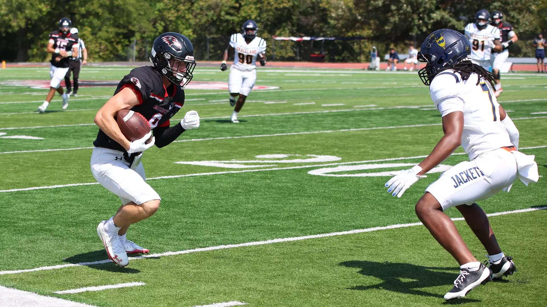 Titan Osburn makes a catch against Graceland as Benedictine crushed the Yellowjackets 52-29 at Larry Wilcox Stadium/ Photo courtesy Ava Moore- RavenAthletics