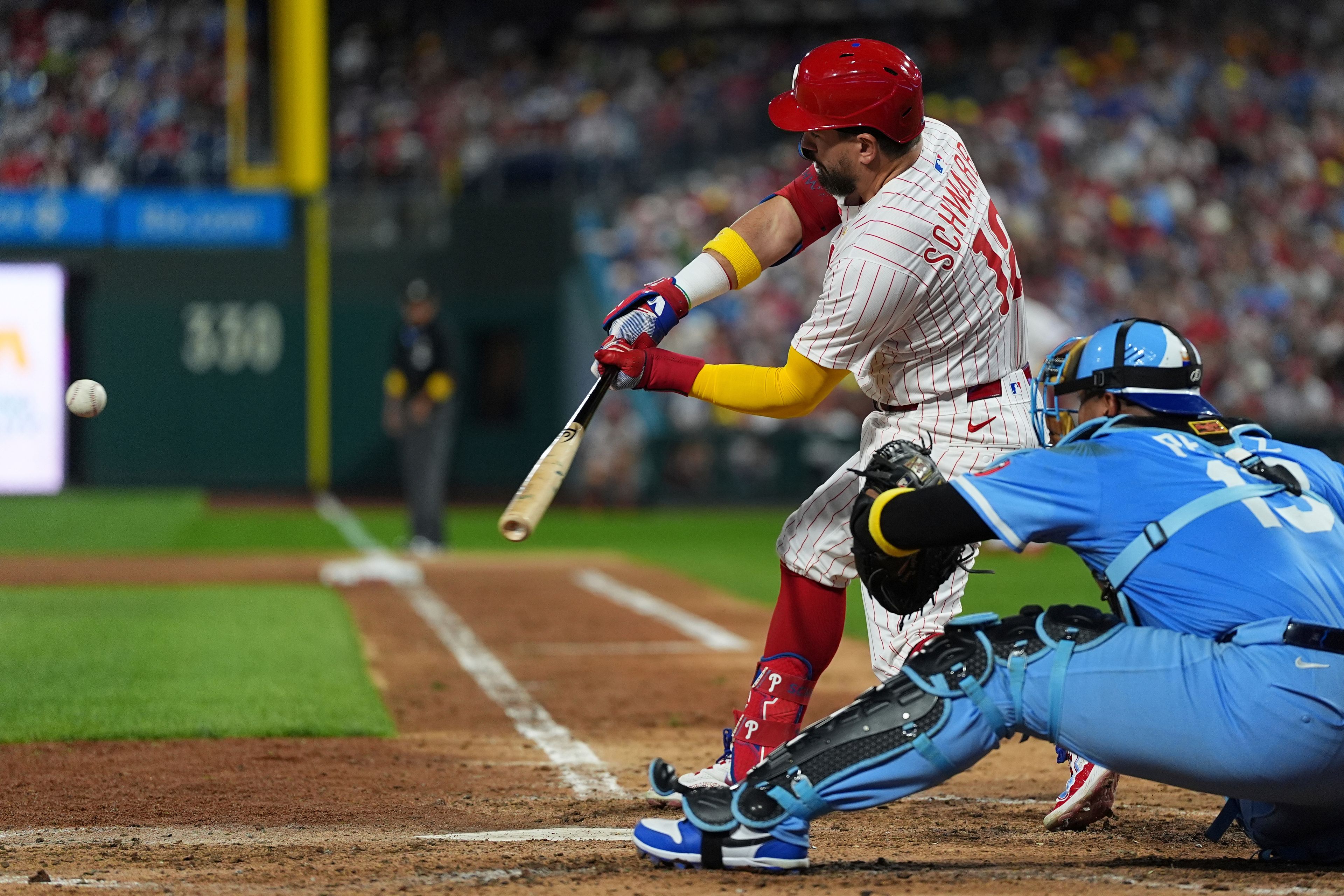 Philadelphia Phillies' Kyle Schwarber hits a home run off of Kansas City Royals pitcher Angel Zerpa during the fifth inning of a baseball game, Saturday, Sept. 13, 2025, in Philadelphia. (AP Photo/Matt Rourke)