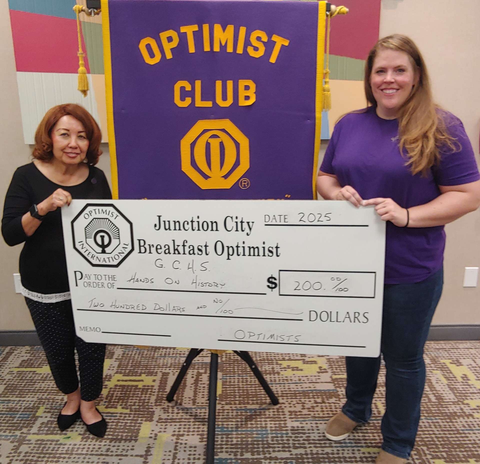 Pictured left to right: Nita Miller, JC Breakfast Optimist Club President and Heather Hagedorn, Executive Director/Curator for the Geary County Historical Society.