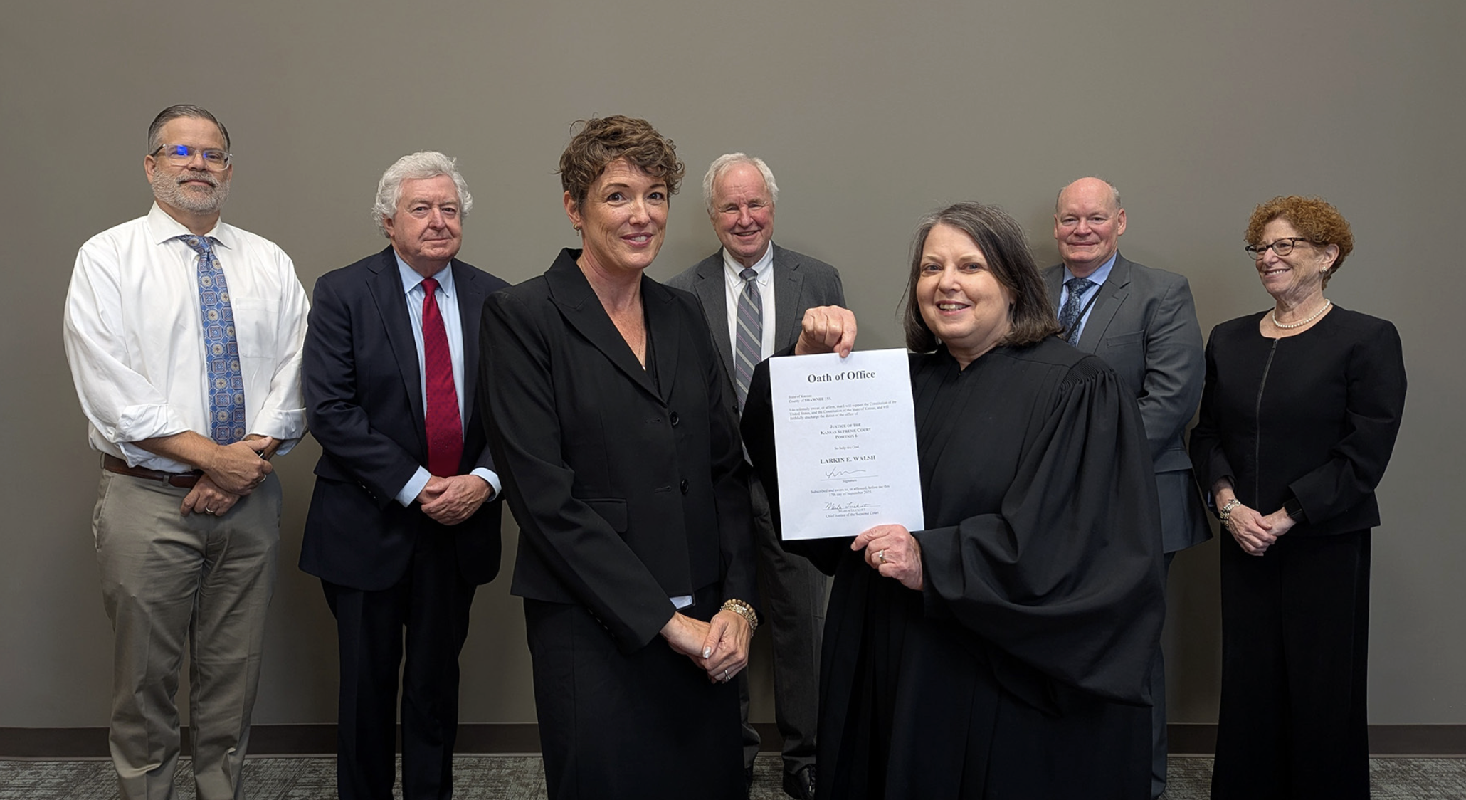 Larkin Walsh, front left, is the Kansas Supreme Court’s newest justice after an informal swearing in ceremony on Sept. 17, 2025, in Topeka. (Lisa Taylor/Office of Judicial Administration)