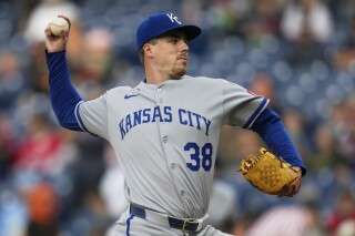 Kansas City Royals' Ryan Bergert pitches in the first inning of a baseball game against the Cleveland Guardians in Cleveland, Monday, Sept. 8, 2025. (AP Photo/Sue Ogrocki)