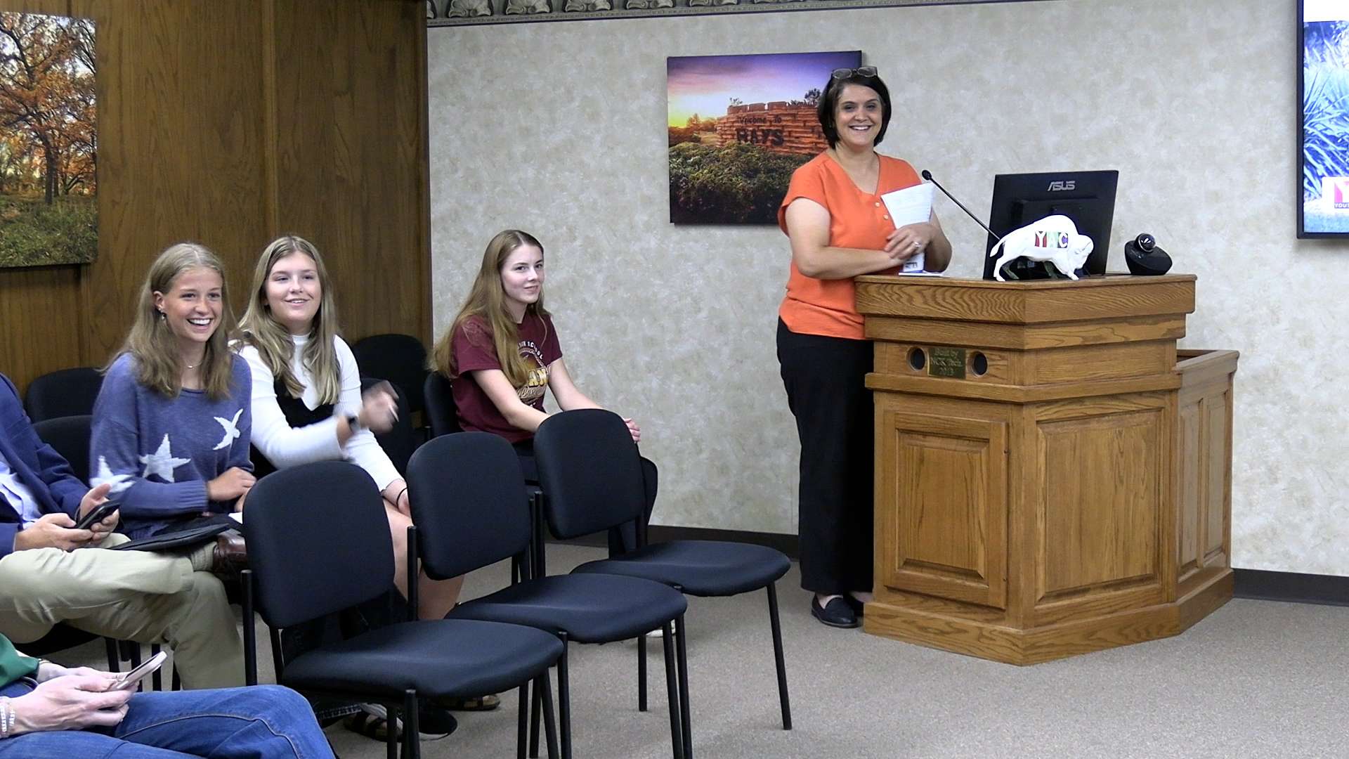Heartland Community Foundation Youth Action Council members Savannah Clingan, Oaklye Wichers and Mariella Dreiling, all seniors at Hays High School, along with&nbsp; Sarah Meitner, executive director, present the "Bison on the Loose" project to Hays city commission on Sept. 18. Photo by Becky Kiser/Hays Post&nbsp;