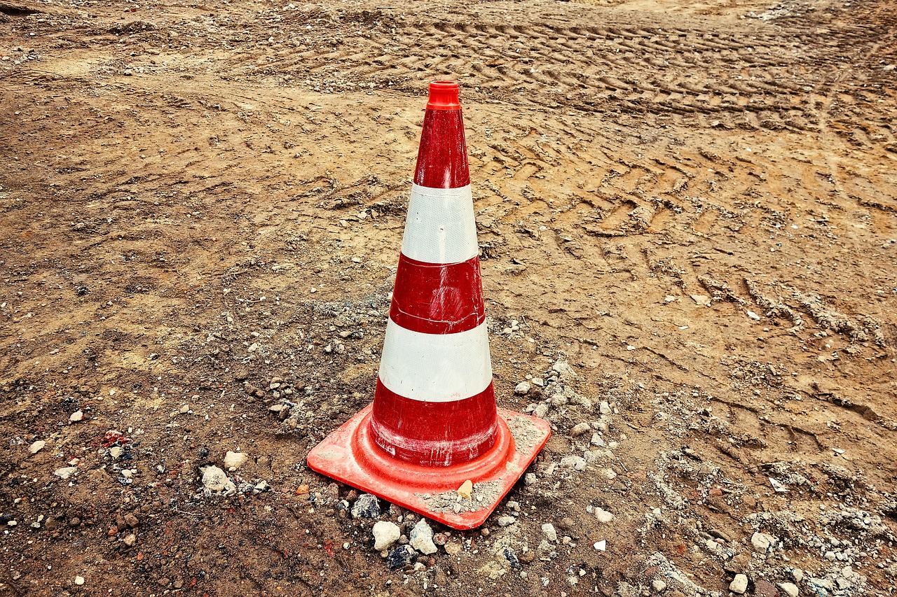traffic cones, pylons, witches' hats, road cones, highway cones, safety cones, construction cones, striped, red-white stripes, traffic, warning, alert, caution, work, symbol, marking, boundary, forbidden, brown work, brown construction, brown safety