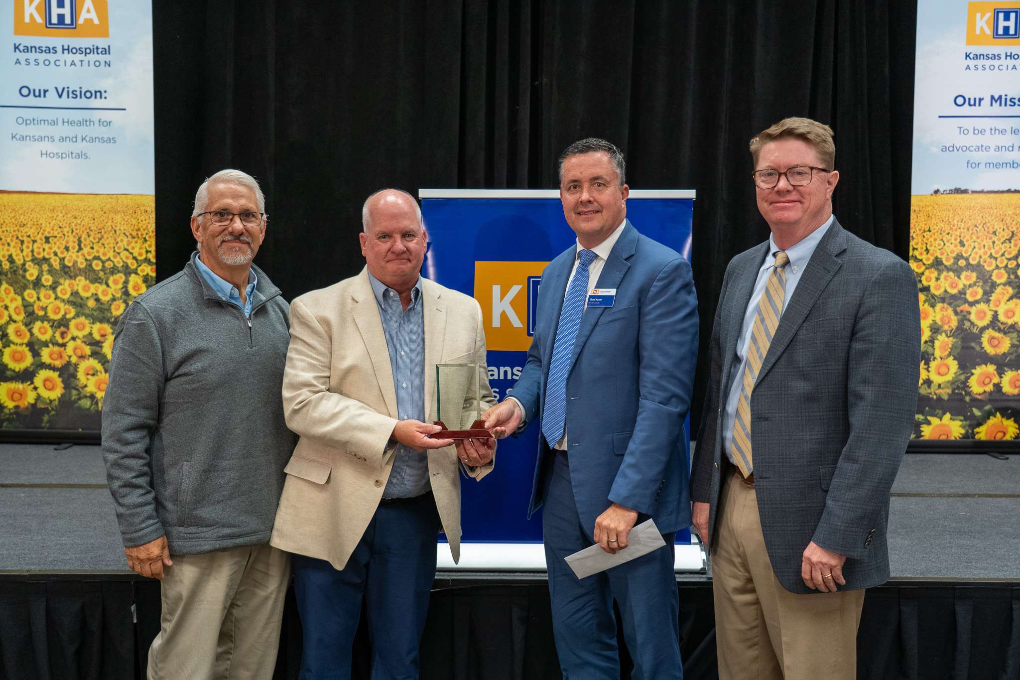 <b>From left to right:&nbsp;David Garnas</b>, Administrator, North Central Kansas Medical Center (Concordia); <b>Phil Gilliland</b>, Board of trustees member for North Central Kansas Medical Center and Salina Regional Health Center; <b>Chad Austin</b>, Kansas Hospital Association (KHA) President and CEO; <b>Joel Phelps</b>, CEO, Salina Regional Health Center (Salina). Photo courtesy of KHA