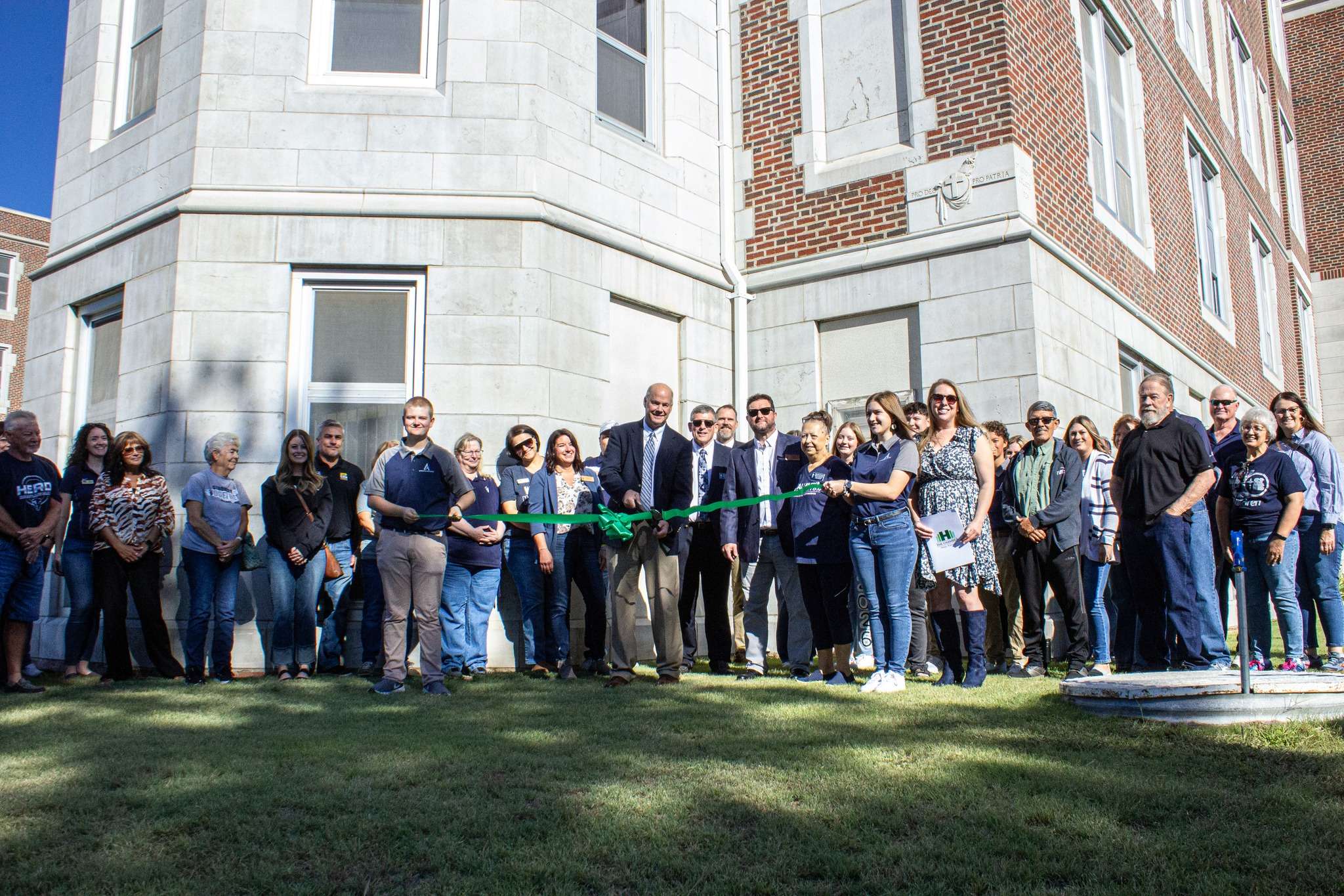 Ribbon cutting at the Thomas More Prep-Marian to celebrate the 100th anniversary of the placing of the cornerstone of the school. Photo courtesy of the Chamber in Hays