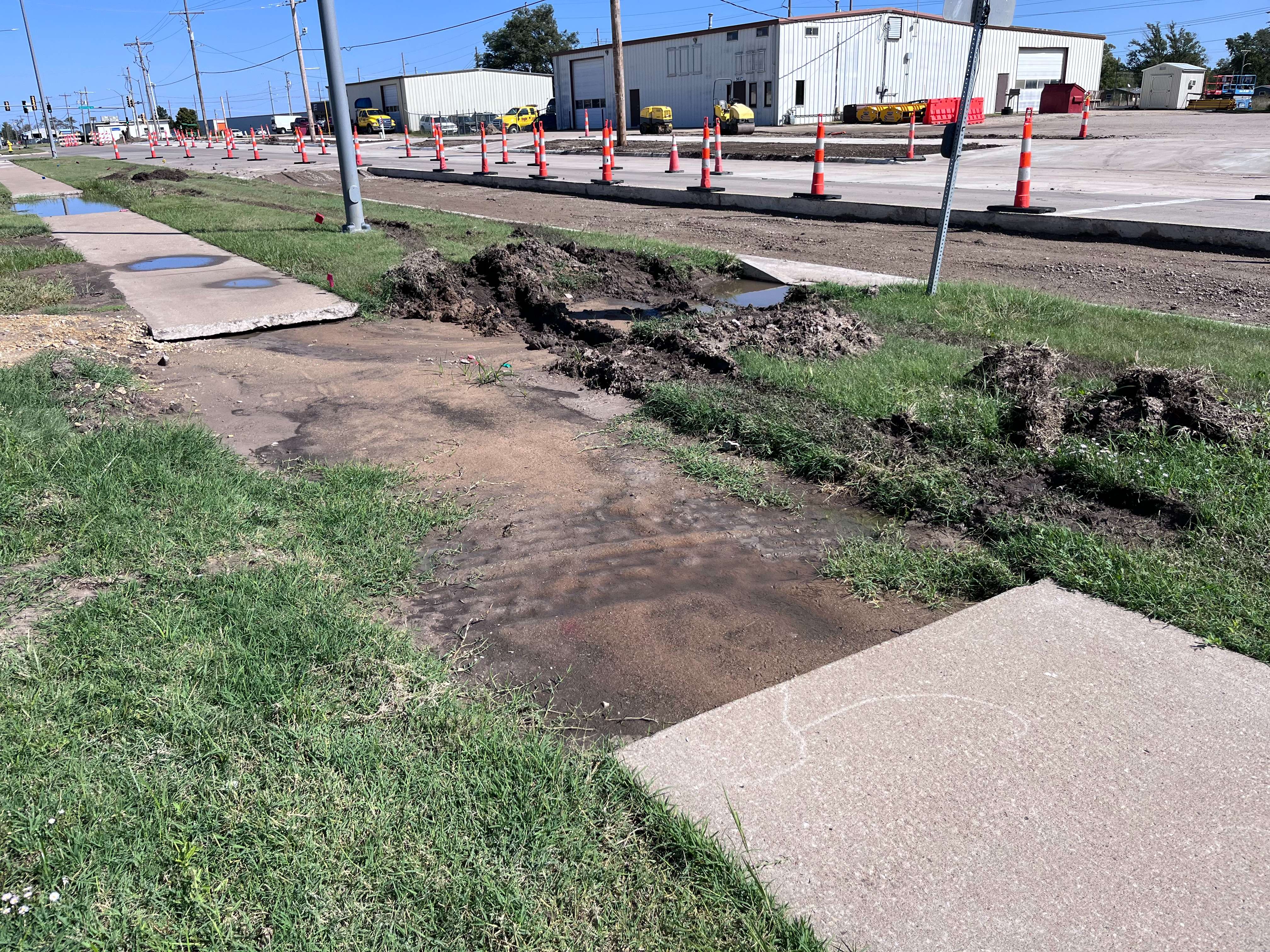 Construction on the sidewalk along Centennial road near Schwan's. Photo by Nicolas Fierro