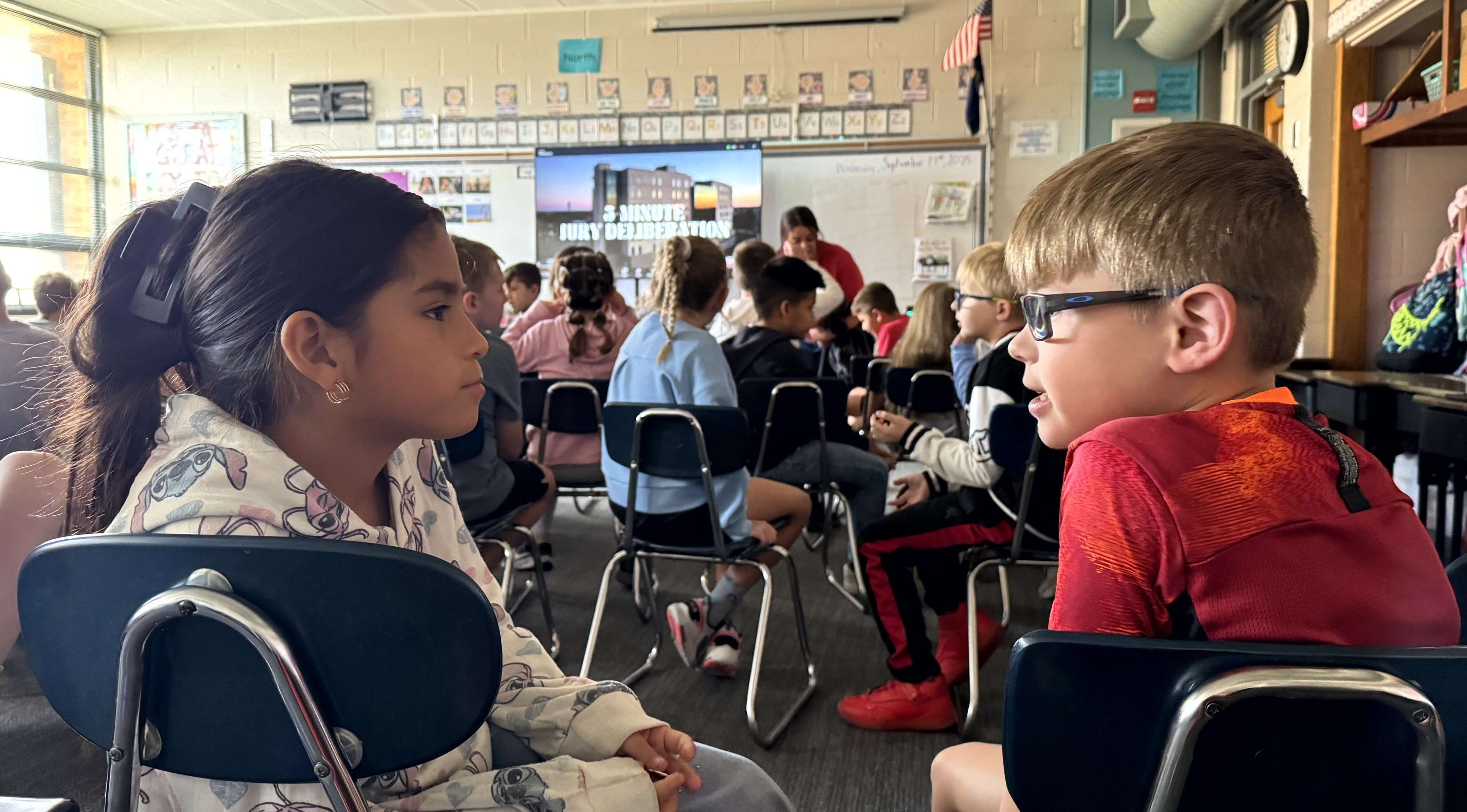 Third-grade students at Jefferson (pictured) and Riley Elementary Schools participated in a virtual mock trial hosted by Olathe Public Schools as part of Freedom Week and Constitution Day. Special guest U.S. Supreme Court Justice Neil Gorsuch shared insights into the Constitution and the three branches of government before students took on the role of “jury” in a fictional case.