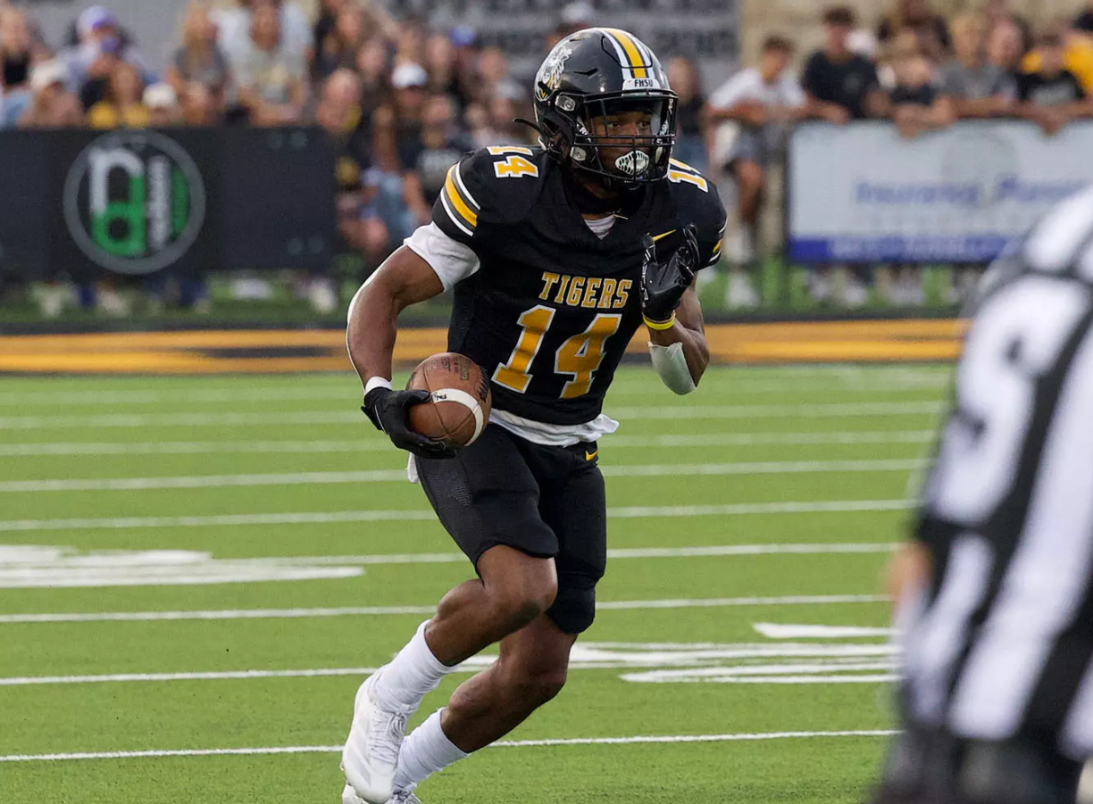 Fort Hays State's Donovan Hunt (14) runs the ball against Nebraska-Kearney on Saturday, September 14, 2025 at Lewis Field in Hays, Kan. (FHSU Athletics photo/Jordyn Bredenburg)