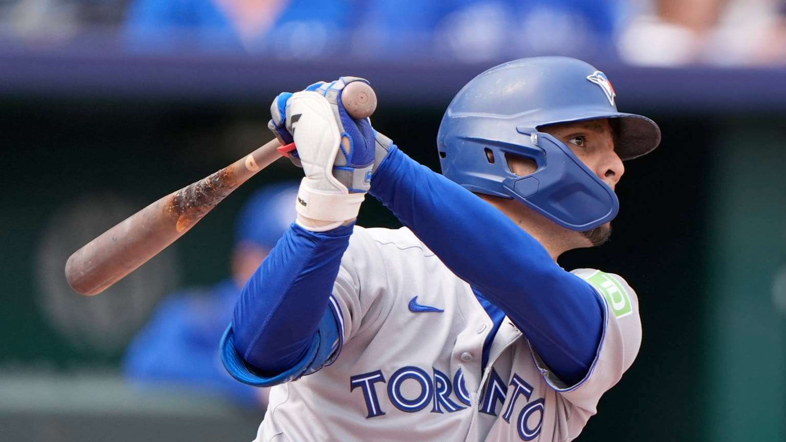 Toronto Blue Jays' Andres Gimenez watches his RBI single during the second inning of a baseball game against the Kansas City Royals, Sunday, Sept. 21, 2025, in Kansas City, Mo. (AP Photo/Charlie Riedel)