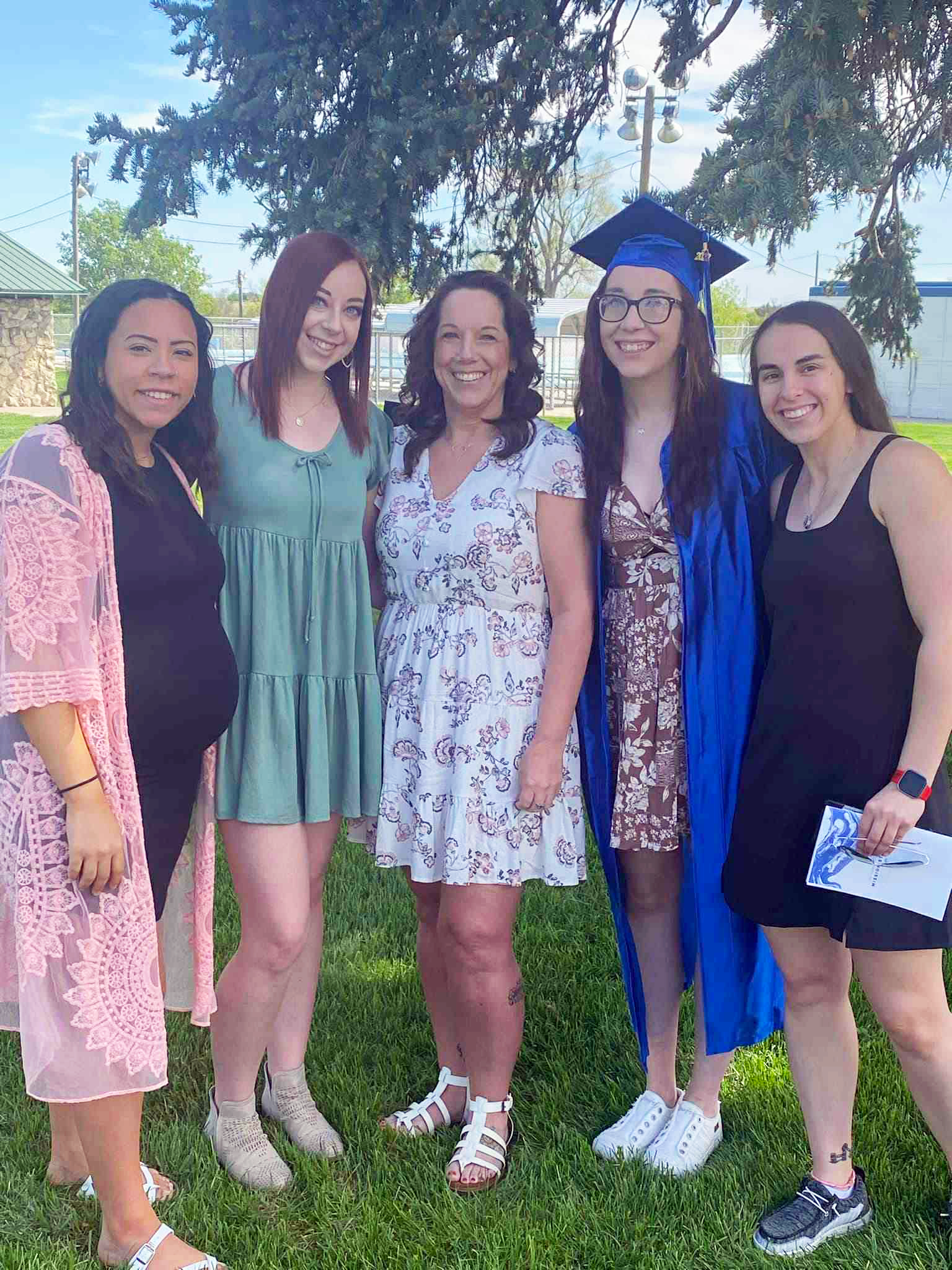 Janeen and her four daughters at Andee's graduation. Left to Right: Anastasia Miller, Ashley Winder, Janeen White Gill, Andee Quigley, Autumn Miller. Courtesy Anastasia Miller. 