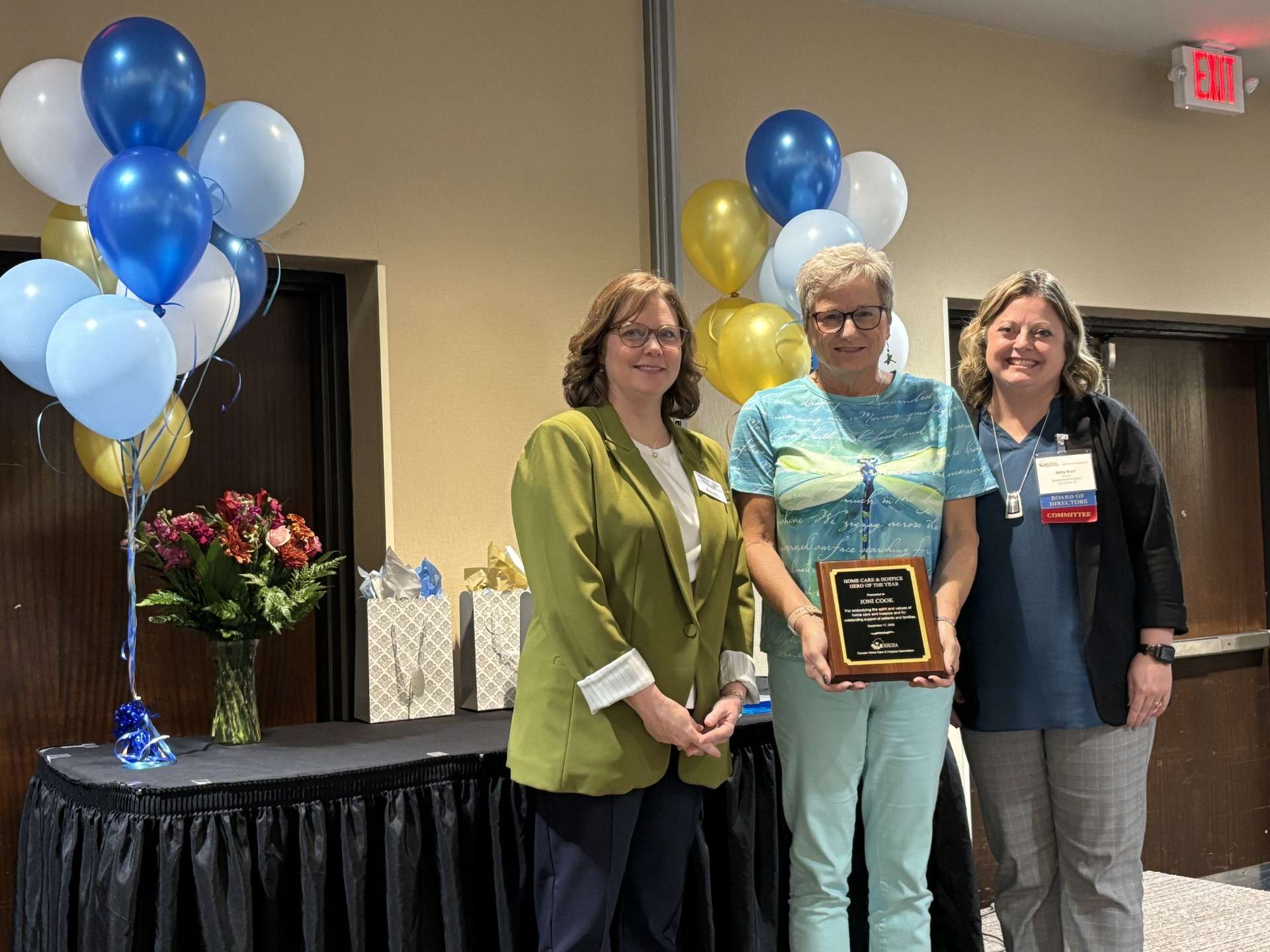 Volunteer, Joni Cook (middle) receives statewide award, recognizing her dedicated service with Home Health and Hospice Care throughout Dickinson County, KS. Courtesy of Memorial Health System