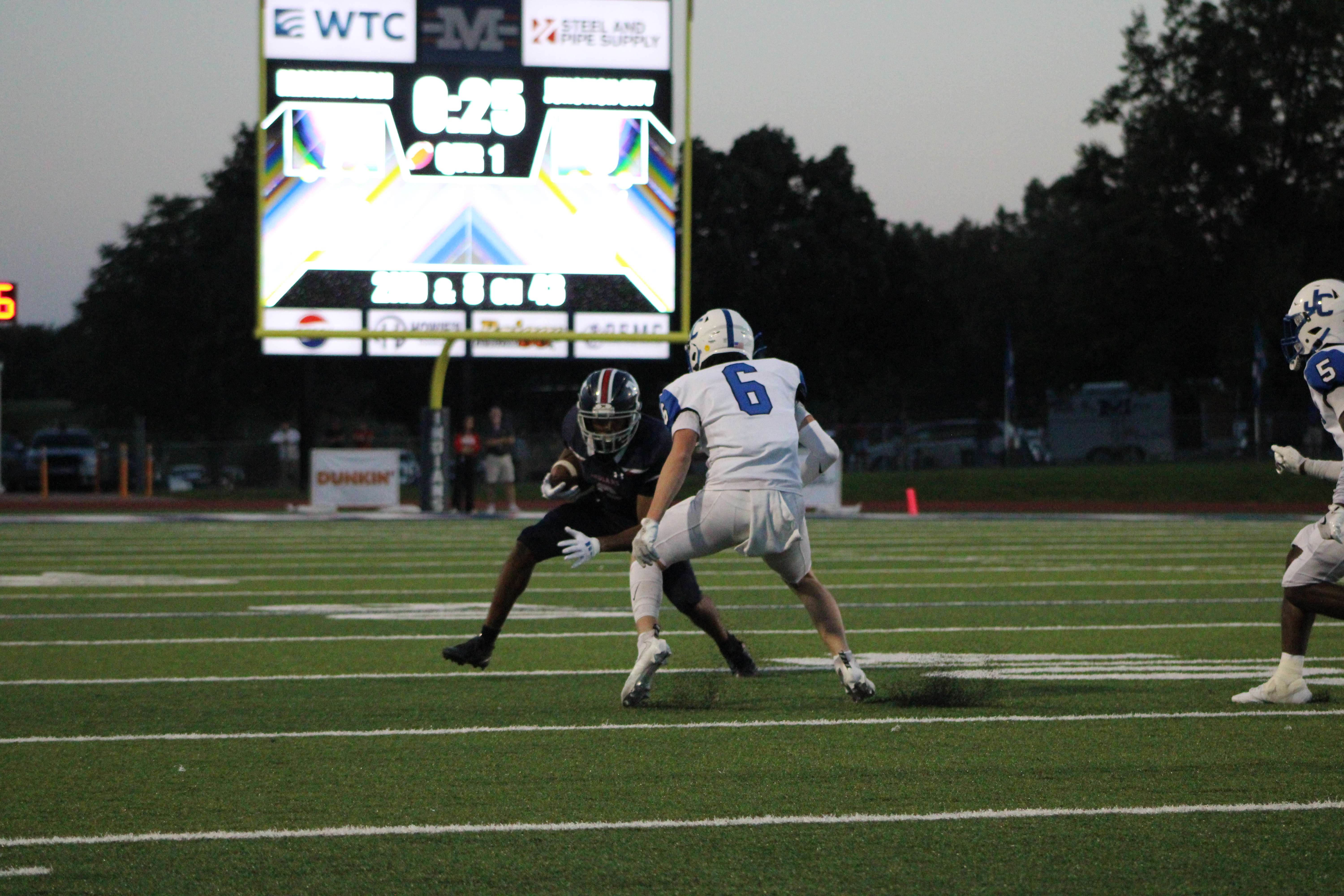 Marshall Karmann #6 in white, was named Defensive Player of the Game.