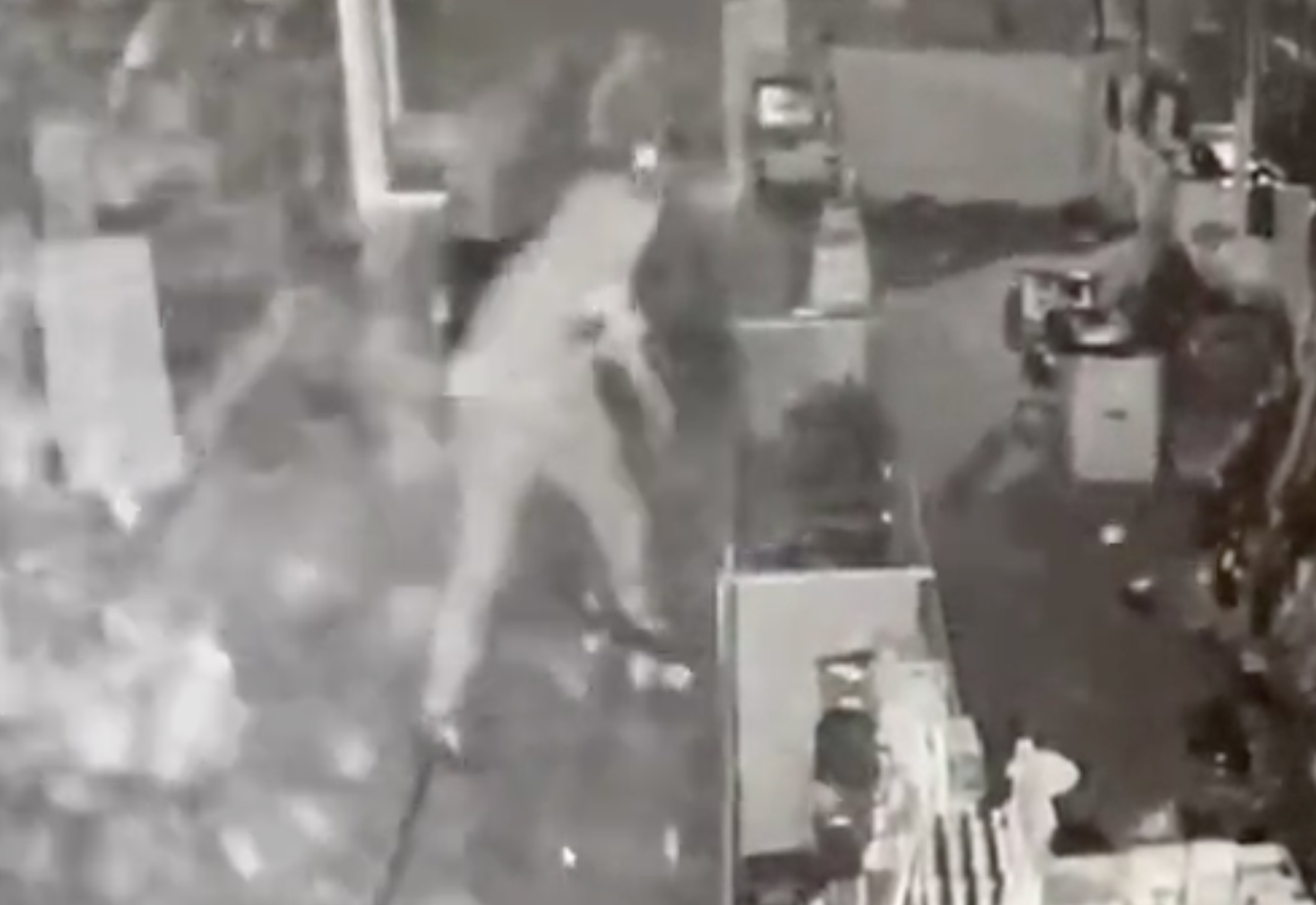 Security camera image from the burglary in June of 2023 released by Blue Steel Guns and Ammo