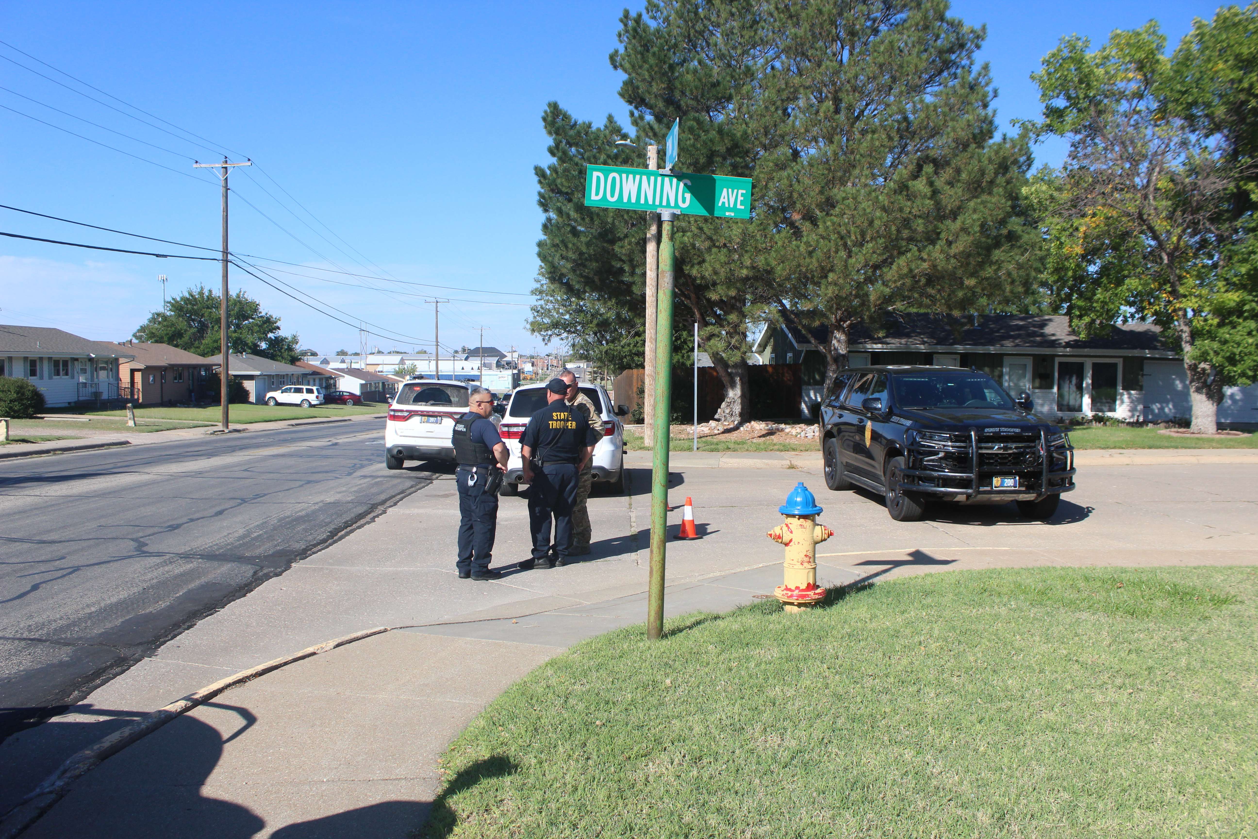 Officers at the corner of 22nd and Downing near the shooting incident on Sunday morning. Photo by Cristina Janney/Hays Post