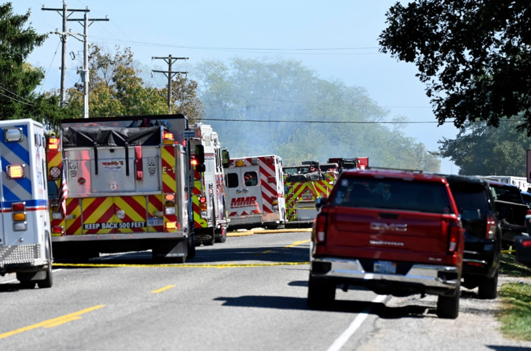 Fire and EMS vehicles are parked The Church of Jesus Christ of Latter-day Saints where a shooting took place on Sept. 28, 2025, in Grand Blanc, Michigan.