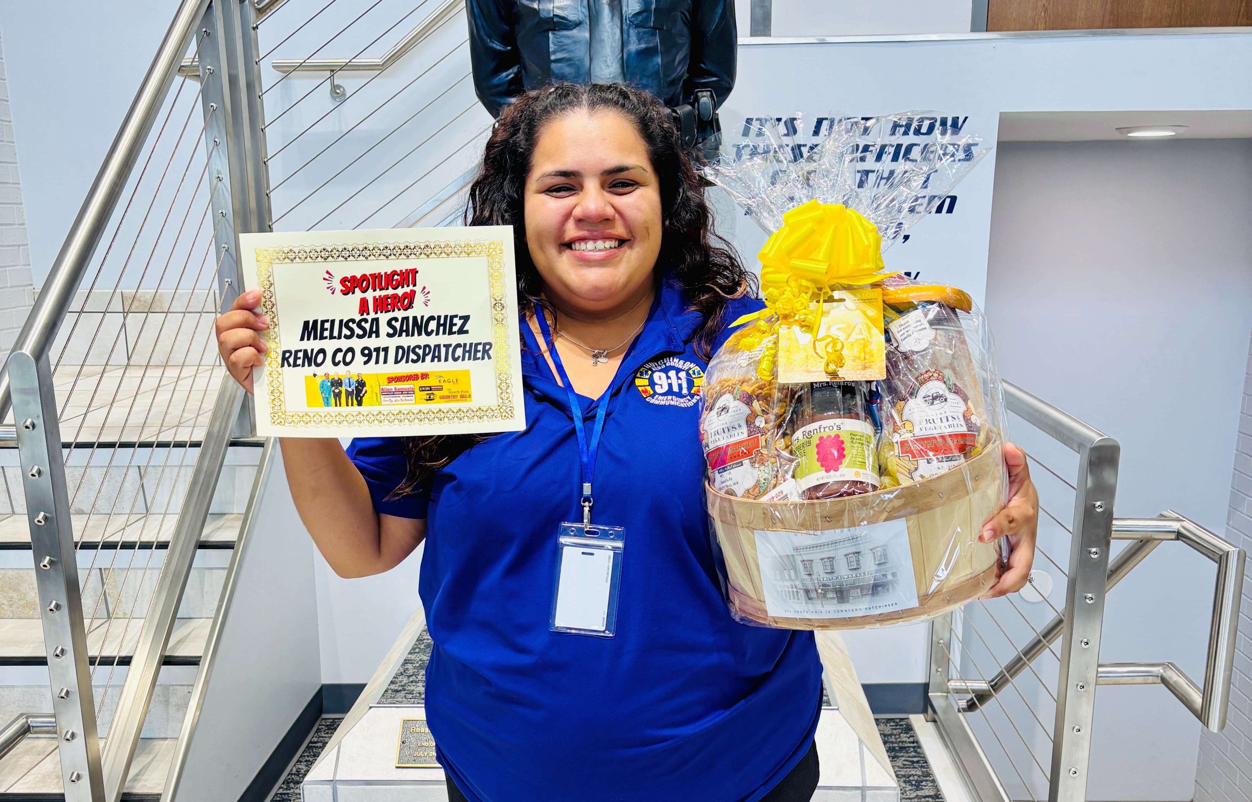 Melissa Sanchez, a 911 dispatcher with Reno County Emergency Communications, poses after receiving the Allen Samuels Chrysler Dodge Jeep Ram First Responder of the Month award for September. (Hutch Post Photo)