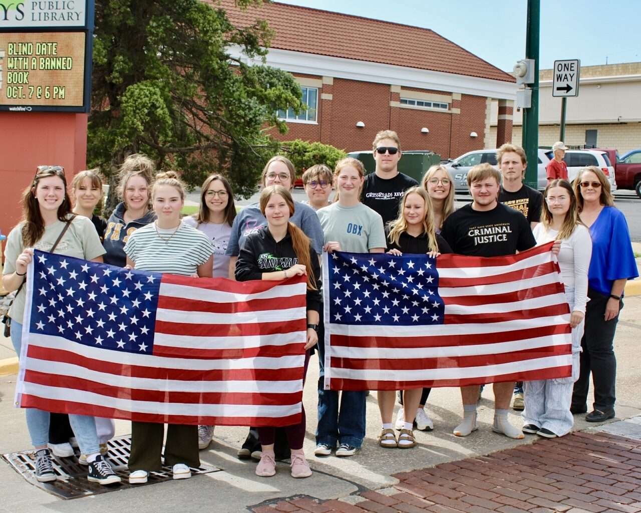A group of Fort Hays State University criminal justice students paying respects to Hays Police Sgt. Scott Heimann. Photo by Tony Guerrero/Hays Post