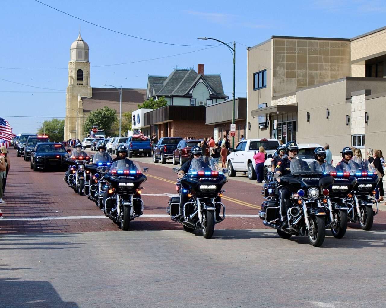 The arrival of the escort for Sgt. Scott Heimann's on Main Street in Hays. Photo by Tony Guerrero/Hays Post