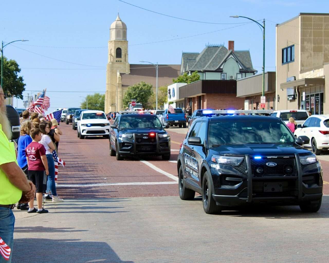 The escort for Sgt. Scott Heimann's on Main Street in Hays. Photo by Tony Guerrero/Hays Post