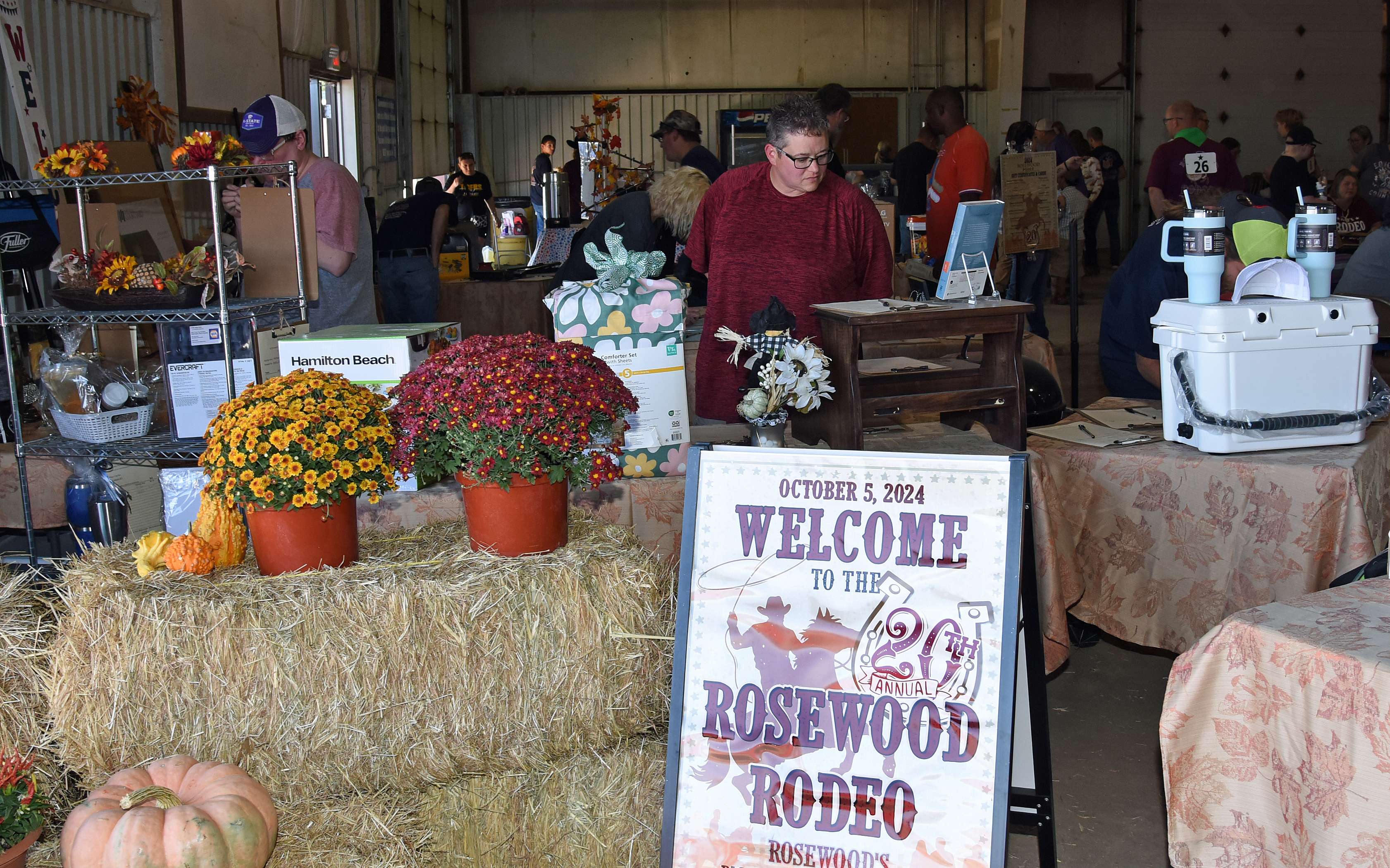Attendees check on the many selections of quality silent auction items during last year’s Rosewood Rodeo. There are more than 70 auction items to bid on at this year’s Rosewood Rodeo. The silent auction annually provides a fun opportunity to purchase quality items at under-market value. Proceeds from the sale of the items, which are donated by community businesses, go directly to Rosewood Roots and Wings Foundation, committed to helping to fund endeavors for people with developmental disabilities.
